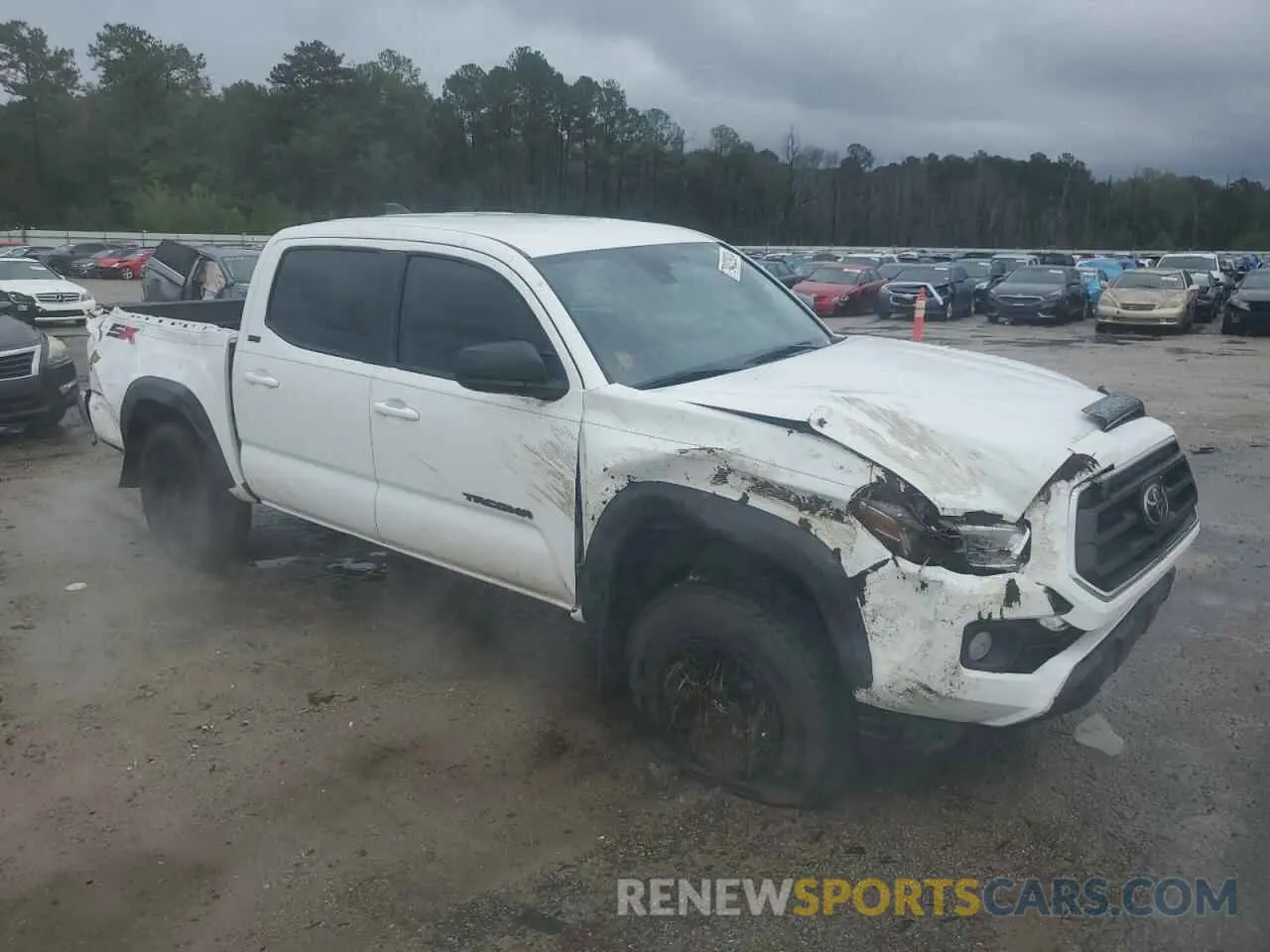 4 Photograph of a damaged car 3TMAZ5CNXPM212698 TOYOTA TACOMA 2023