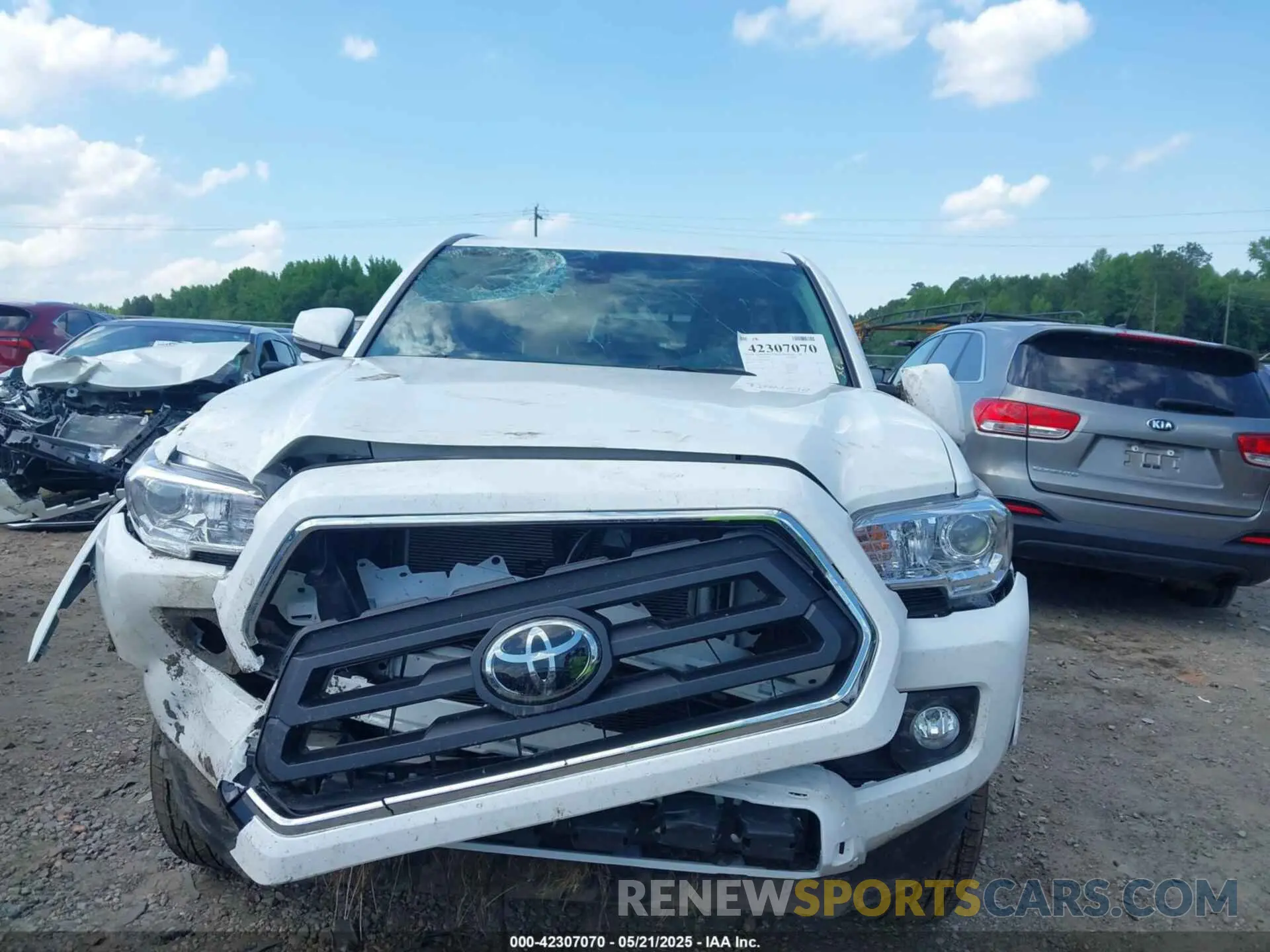 12 Photograph of a damaged car 3TMCZ5AN1PM580022 TOYOTA TACOMA 2023