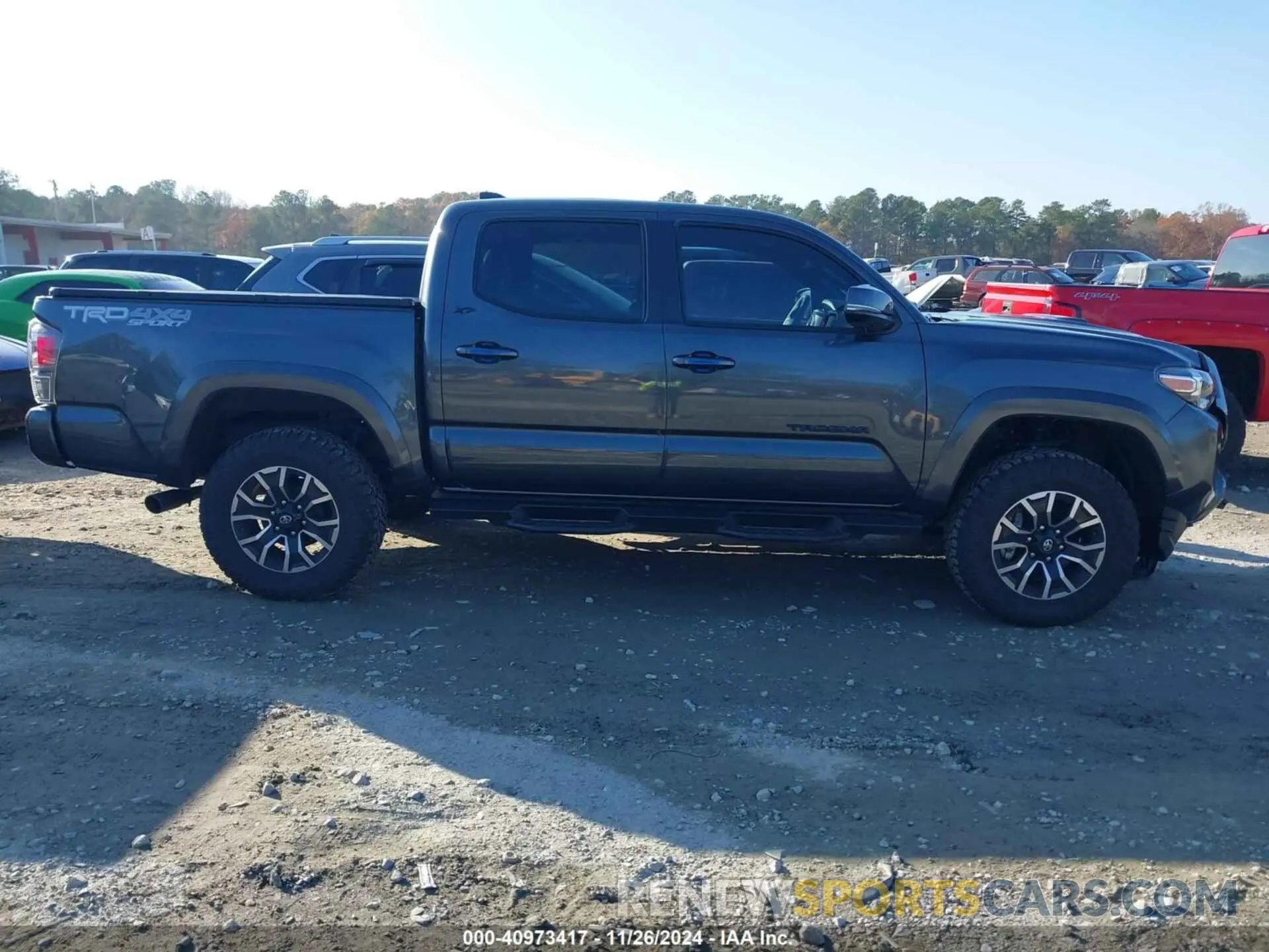 13 Photograph of a damaged car 3TMCZ5AN3PM561939 TOYOTA TACOMA 2023