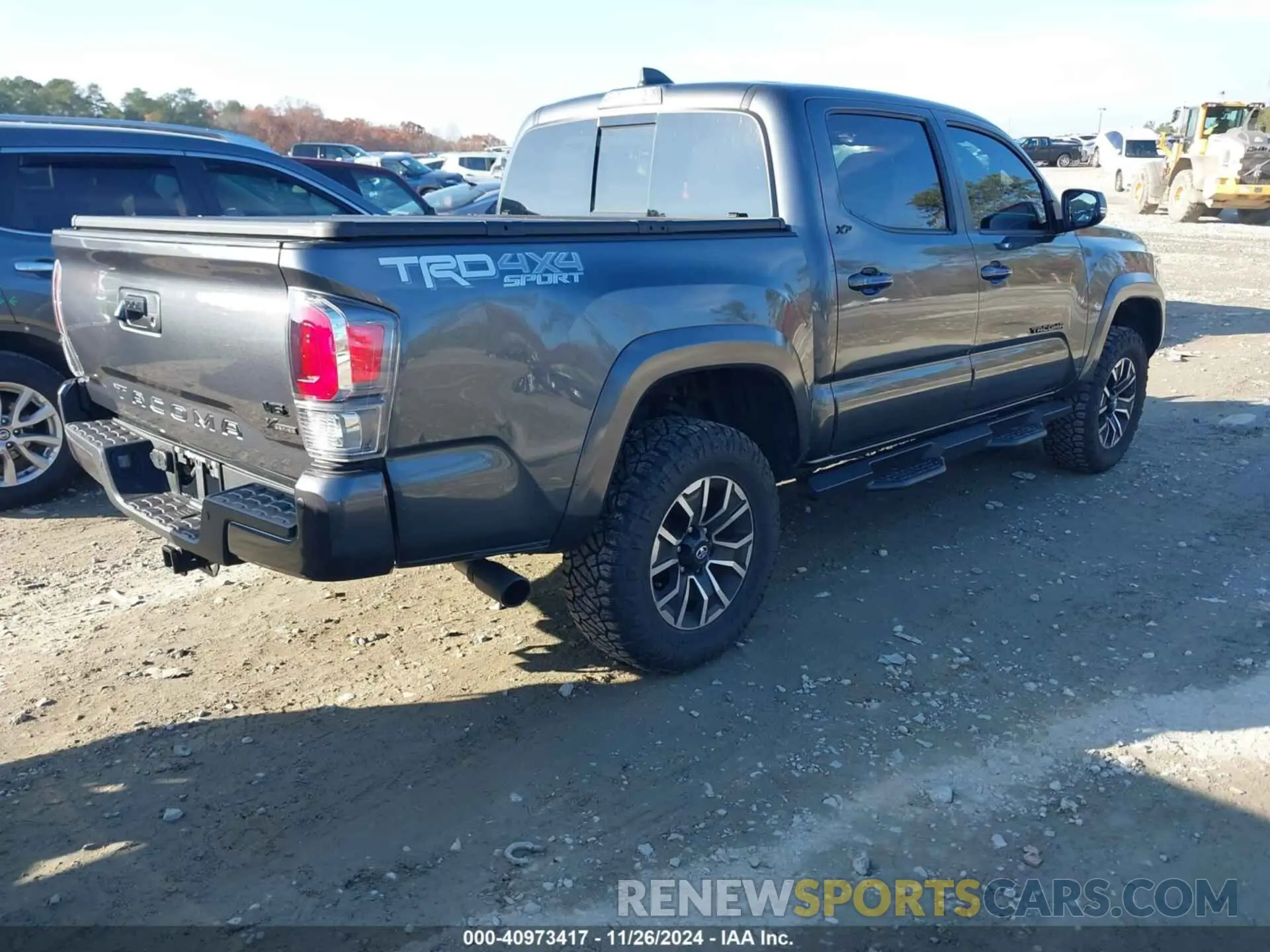 4 Photograph of a damaged car 3TMCZ5AN3PM561939 TOYOTA TACOMA 2023