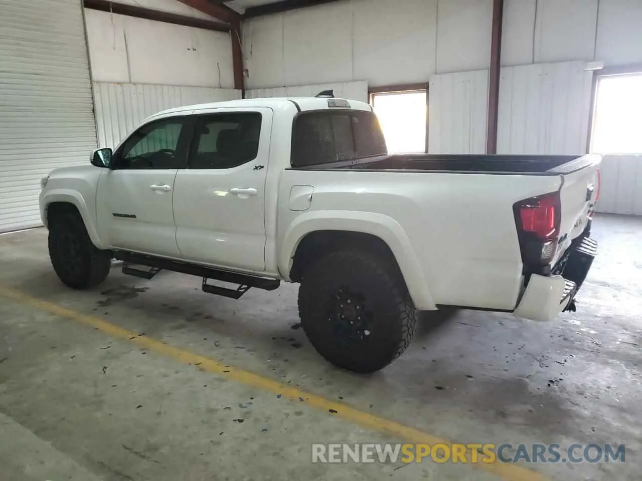 2 Photograph of a damaged car 3TMCZ5AN3PM654492 TOYOTA TACOMA 2023