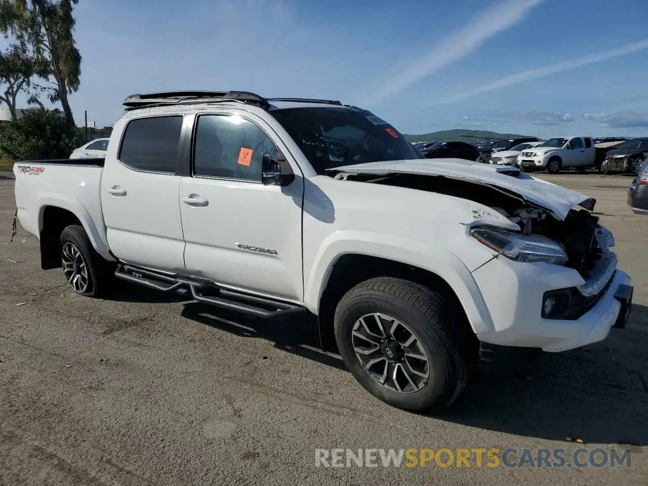 4 Photograph of a damaged car 3TMCZ5AN3PM654542 TOYOTA TACOMA 2023