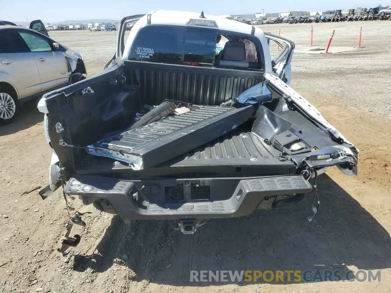 6 Photograph of a damaged car 3TMCZ5AN4PM541165 TOYOTA TACOMA 2023