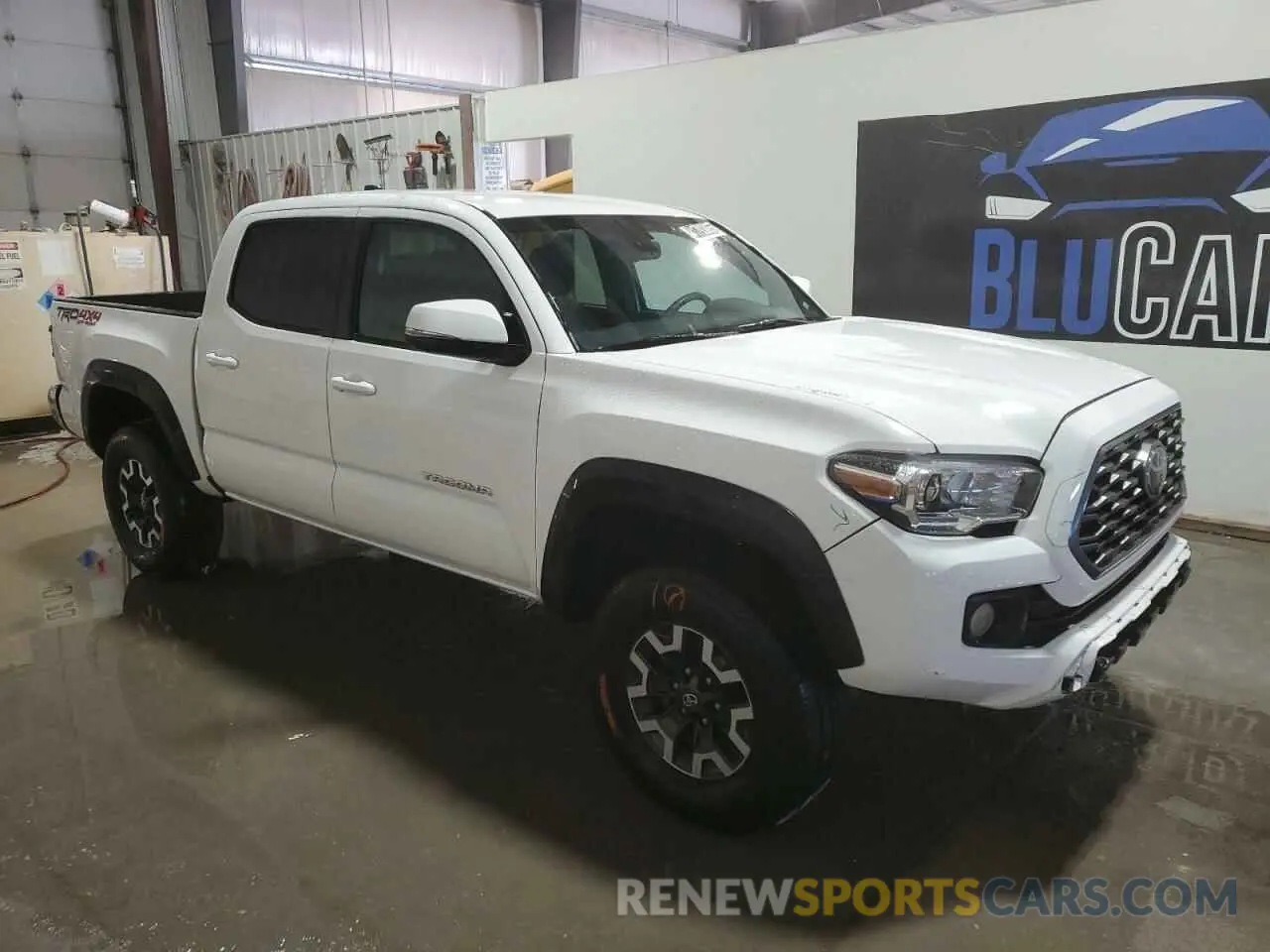 4 Photograph of a damaged car 3TMCZ5AN4PM625454 TOYOTA TACOMA 2023