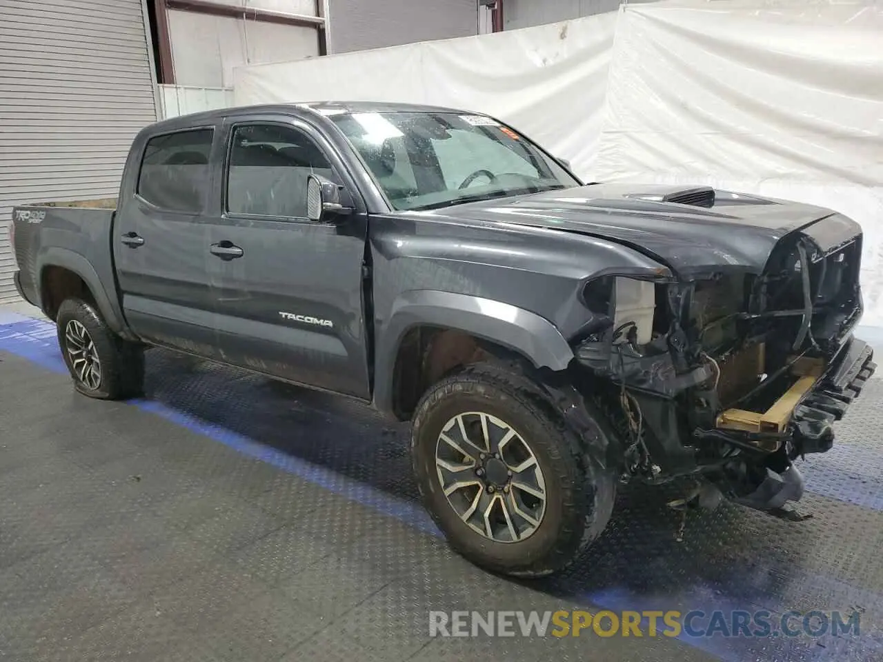 4 Photograph of a damaged car 3TMCZ5AN5PM613314 TOYOTA TACOMA 2023