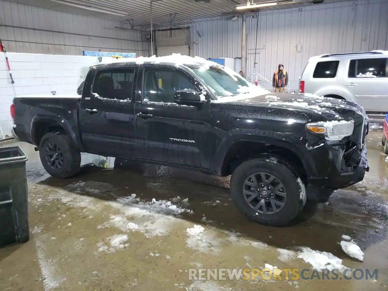 4 Photograph of a damaged car 3TMCZ5AN5PM654185 TOYOTA TACOMA 2023