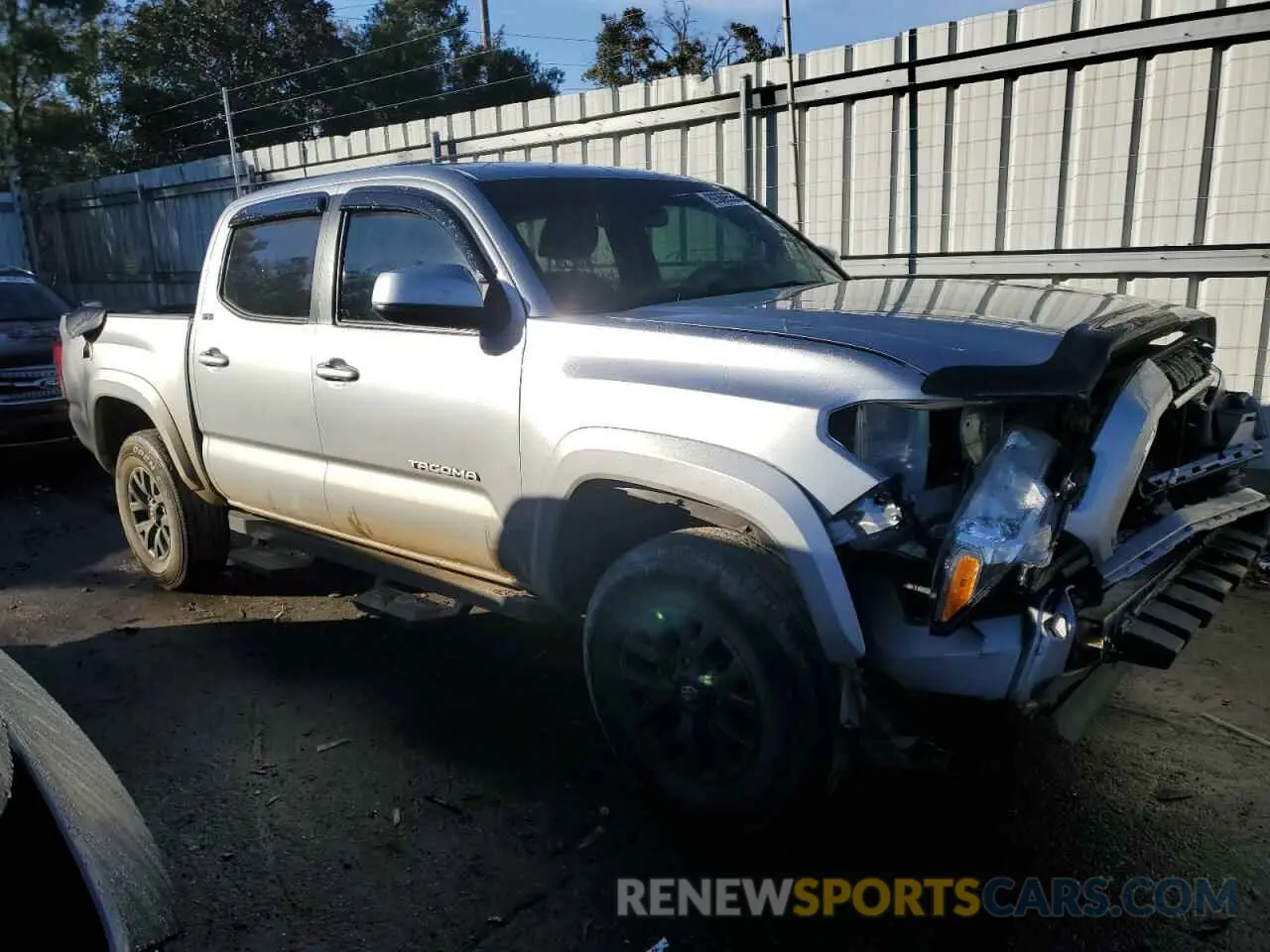 4 Photograph of a damaged car 3TMCZ5AN6PM605903 TOYOTA TACOMA 2023