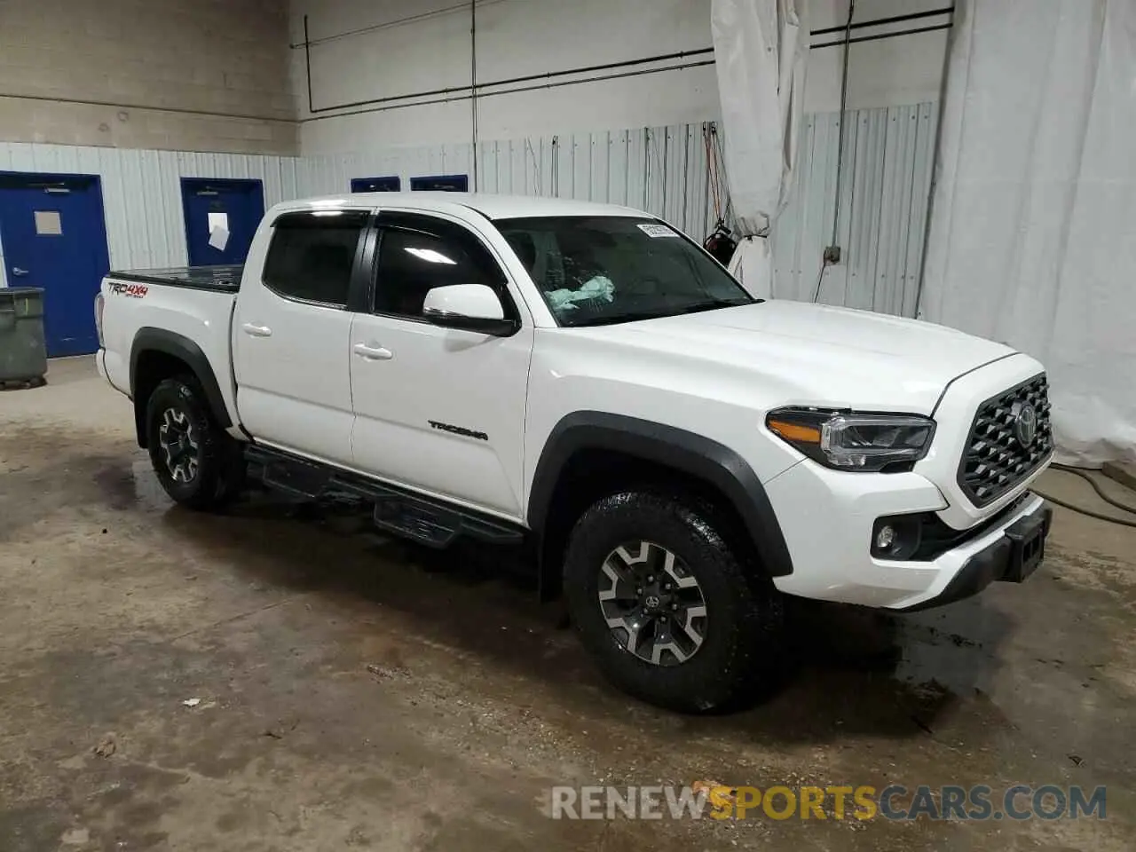 4 Photograph of a damaged car 3TMCZ5AN6PM621793 TOYOTA TACOMA 2023