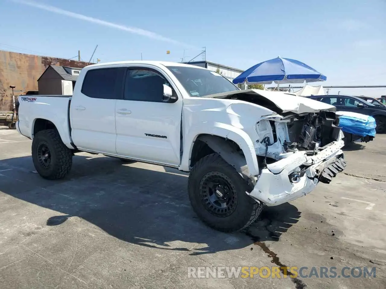 4 Photograph of a damaged car 3TMCZ5AN7PM621155 TOYOTA TACOMA 2023