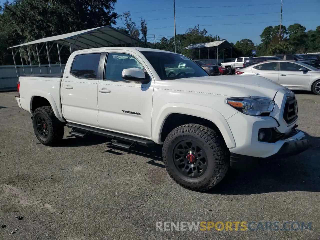 4 Photograph of a damaged car 3TMCZ5AN8PM591177 TOYOTA TACOMA 2023