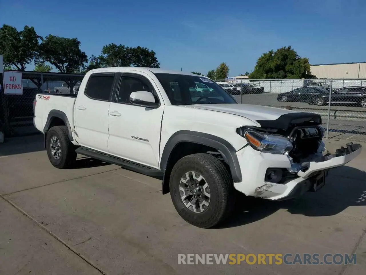 4 Photograph of a damaged car 3TMCZ5AN9PM638538 TOYOTA TACOMA 2023