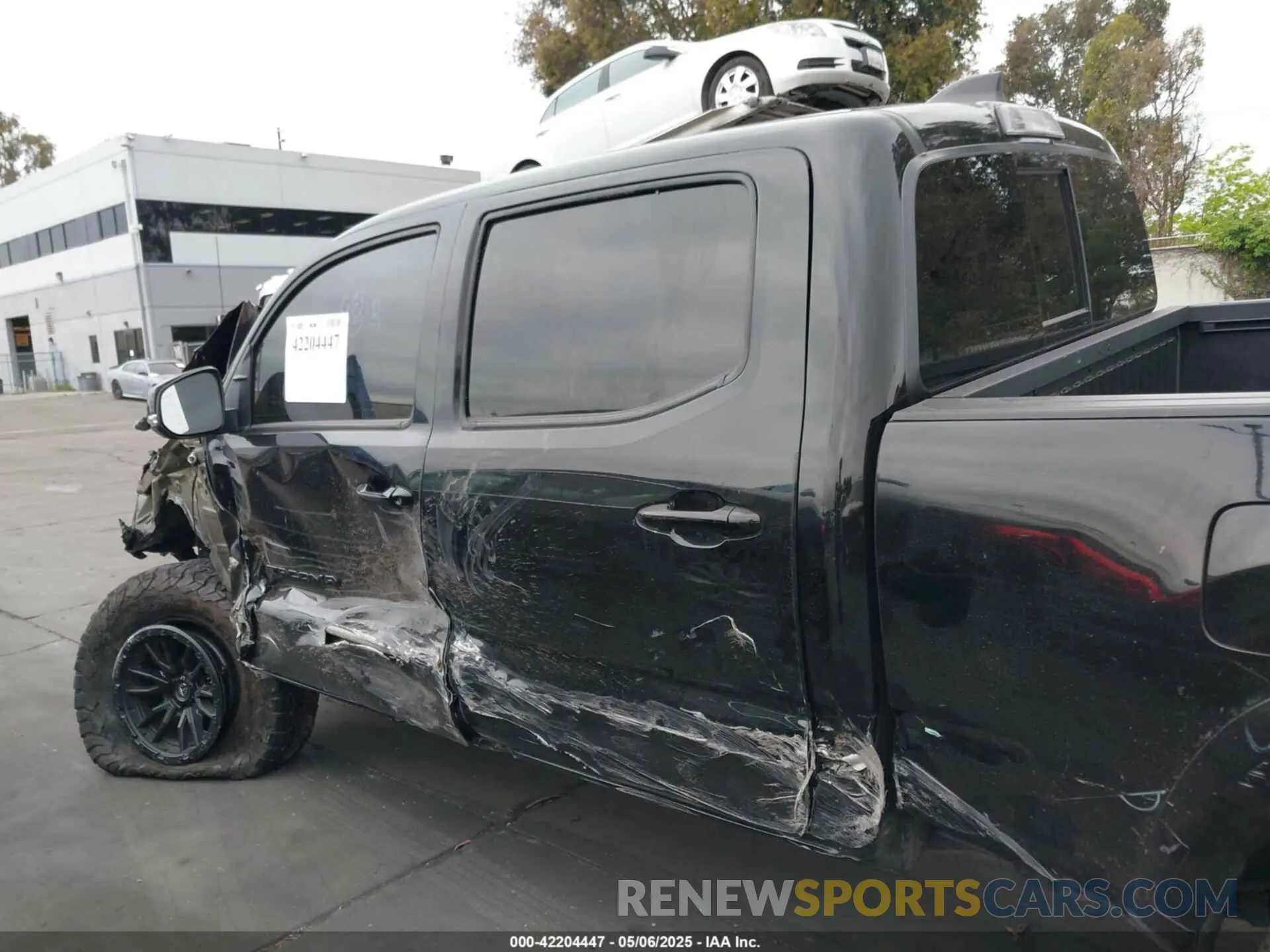 14 Photograph of a damaged car 3TMDZ5BN9PM150970 TOYOTA TACOMA 2023