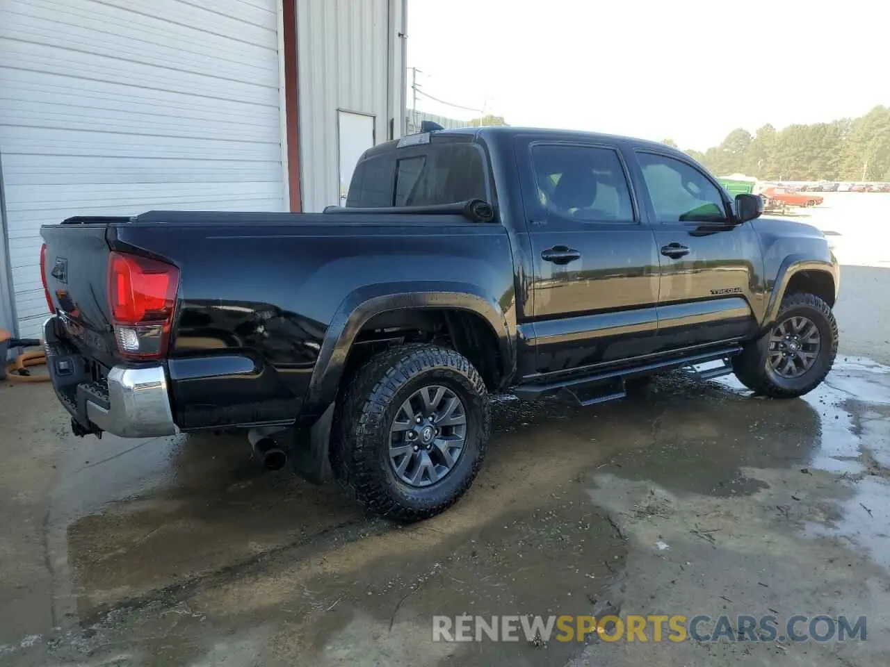 3 Photograph of a damaged car 3TYAZ5CN3PT032628 TOYOTA TACOMA 2023