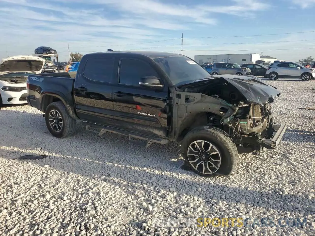 4 Photograph of a damaged car 3TYCZ5AN0PT110522 TOYOTA TACOMA 2023