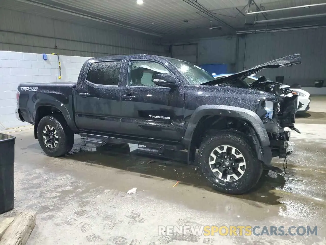 4 Photograph of a damaged car 3TYCZ5AN2PT157955 TOYOTA TACOMA 2023