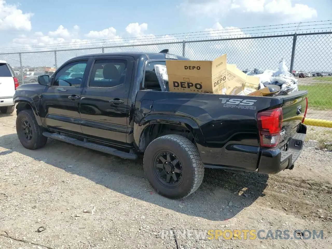 2 Photograph of a damaged car 3TYCZ5AN6PT125350 TOYOTA TACOMA 2023