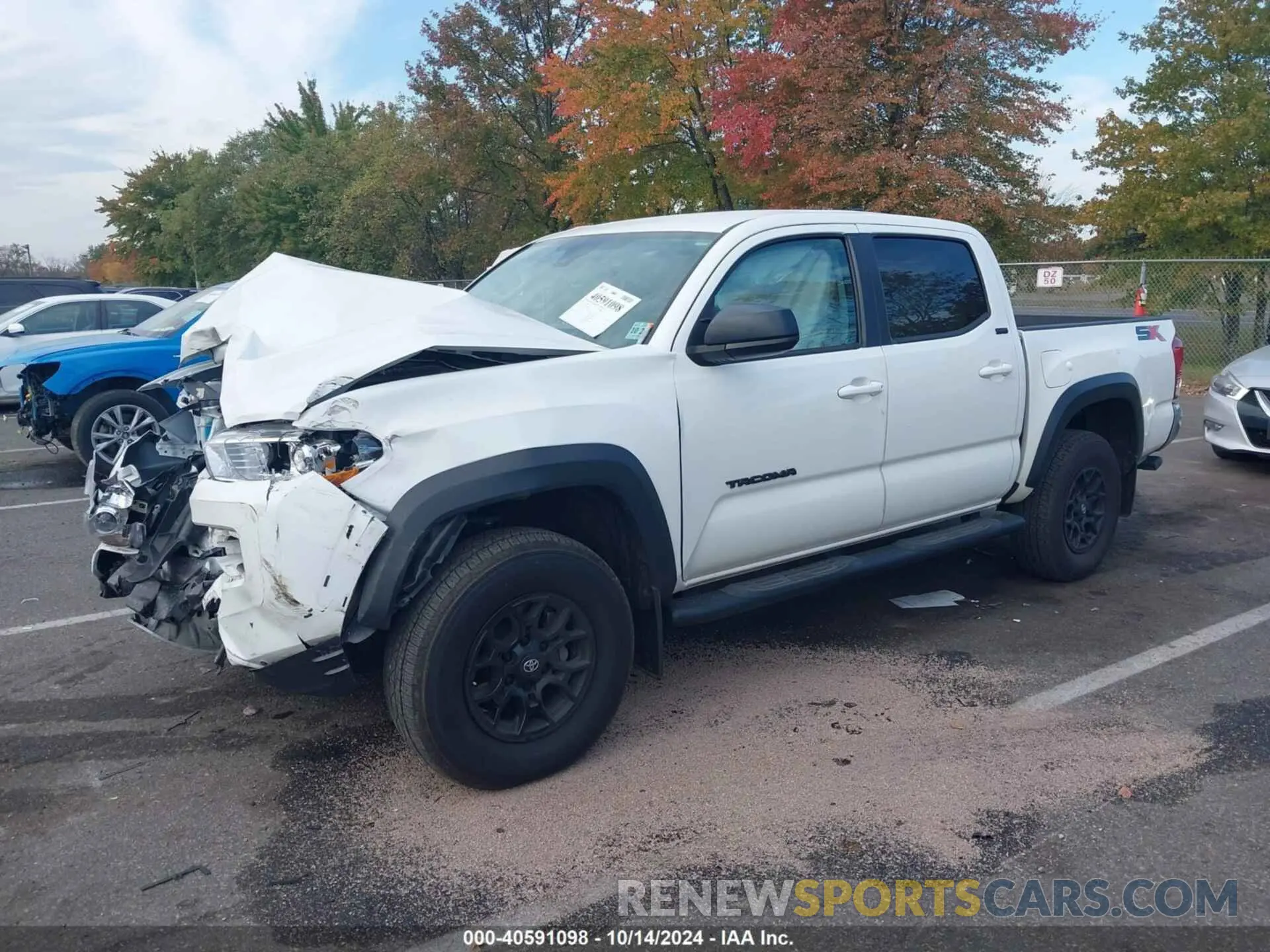 2 Photograph of a damaged car 3TYCZ5ANXPT163874 TOYOTA TACOMA 2023