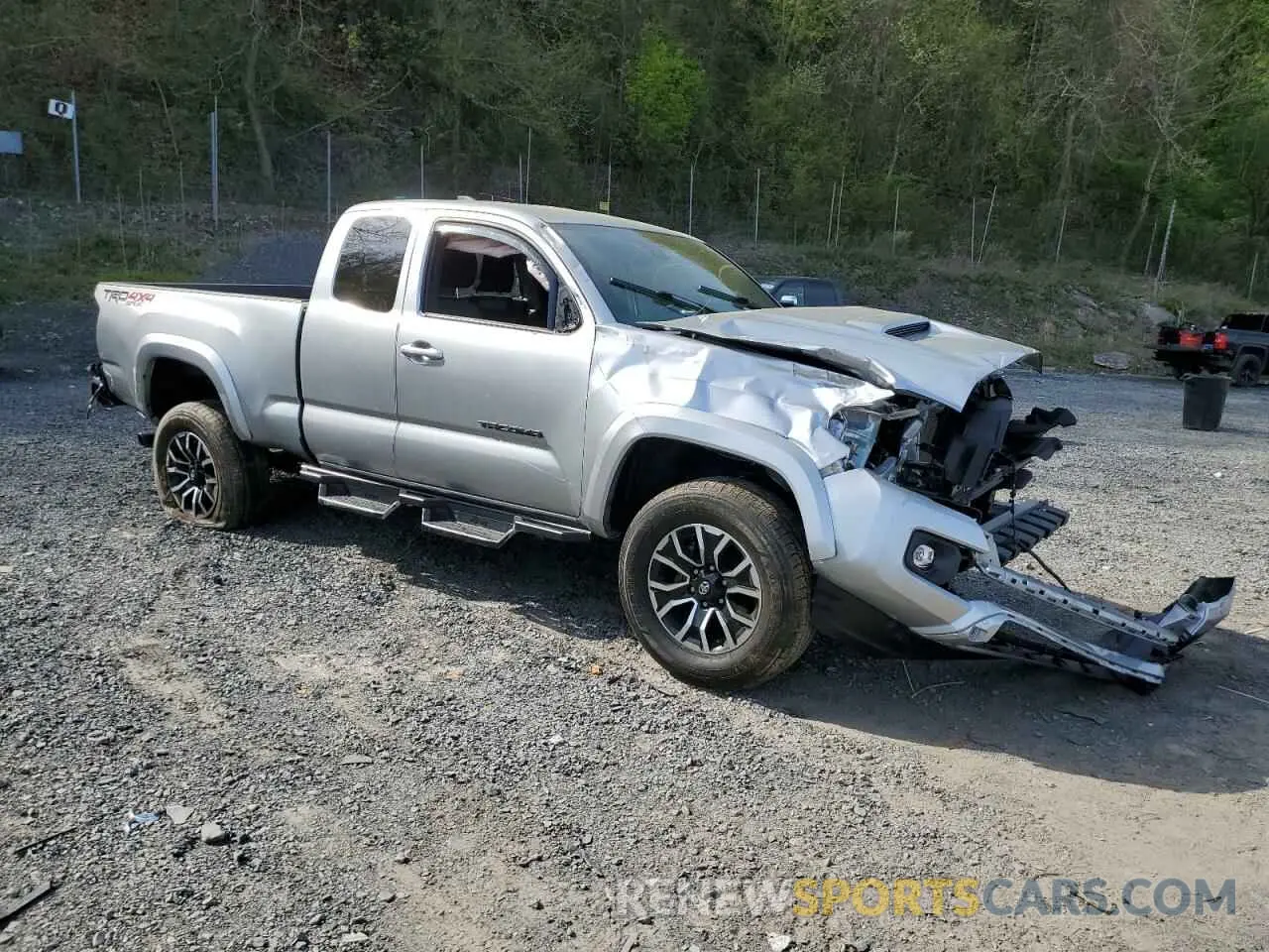 4 Photograph of a damaged car 3TYSZ5AN8PT112112 TOYOTA TACOMA 2023