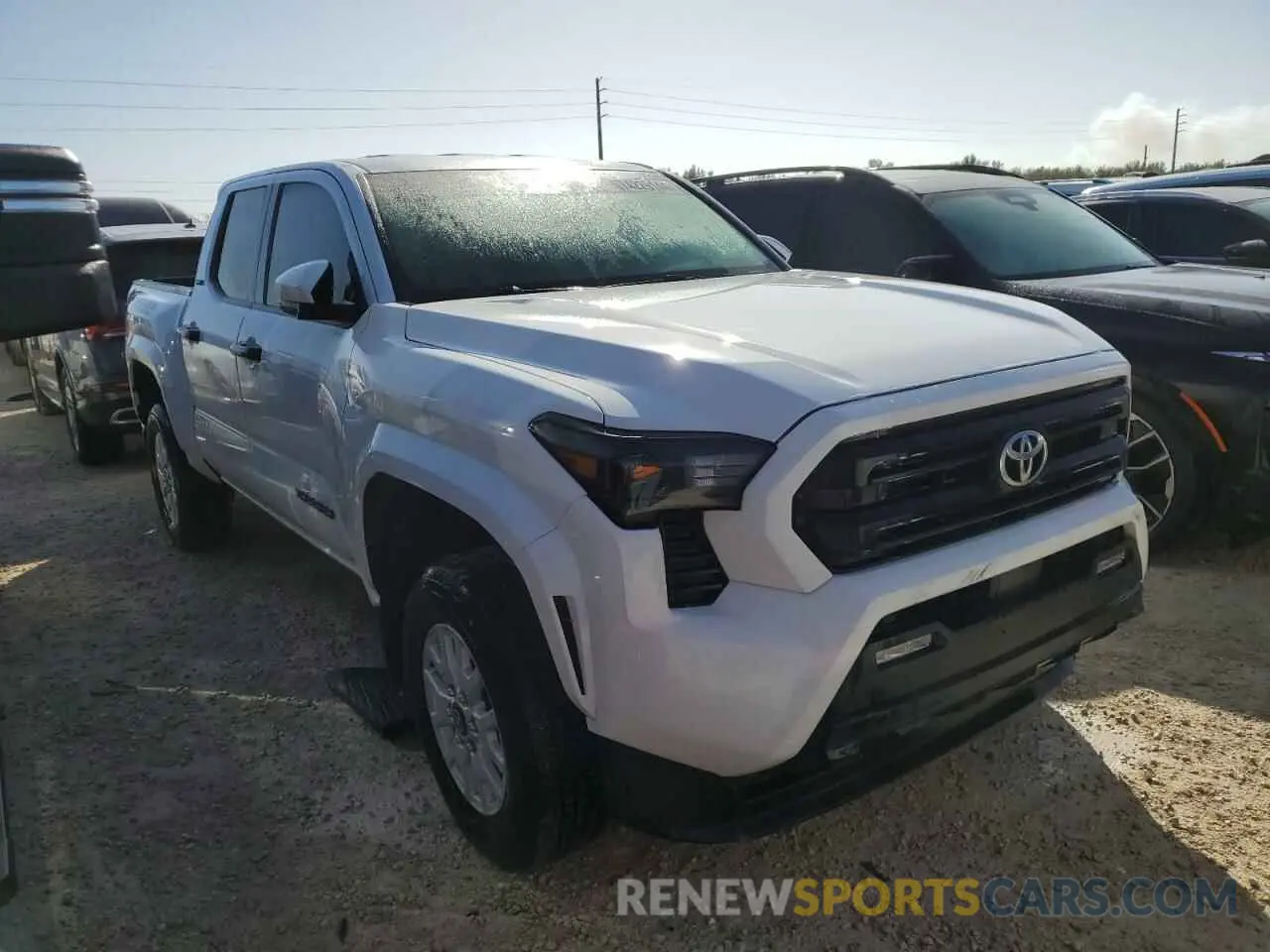 4 Photograph of a damaged car 3TYLB5JN0RT019399 TOYOTA TACOMA 2024