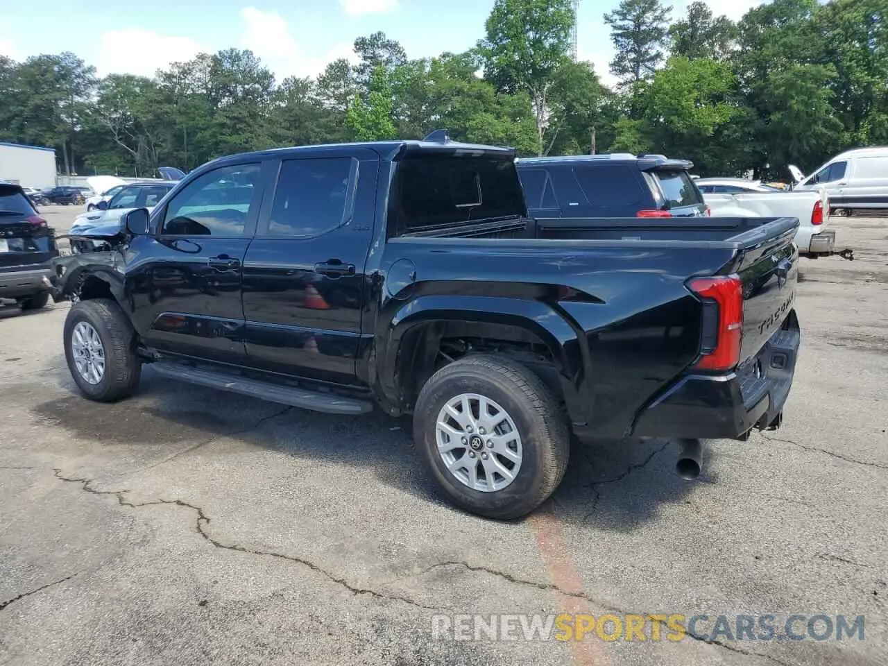 2 Photograph of a damaged car 3TYLB5JN0RT030340 TOYOTA TACOMA 2024