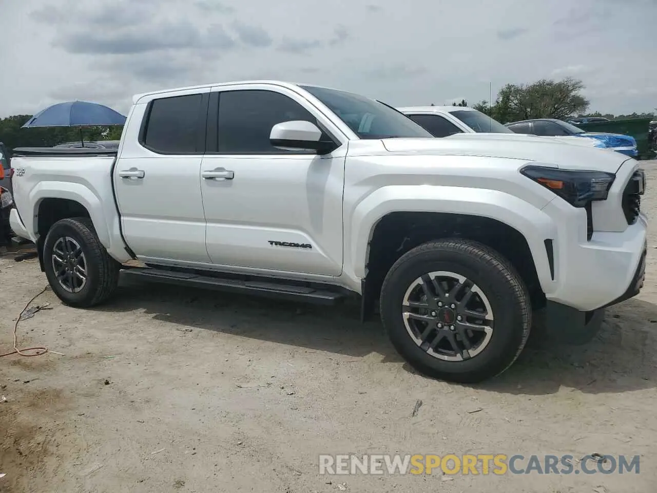 4 Photograph of a damaged car 3TYLB5JN2RT038214 TOYOTA TACOMA 2024
