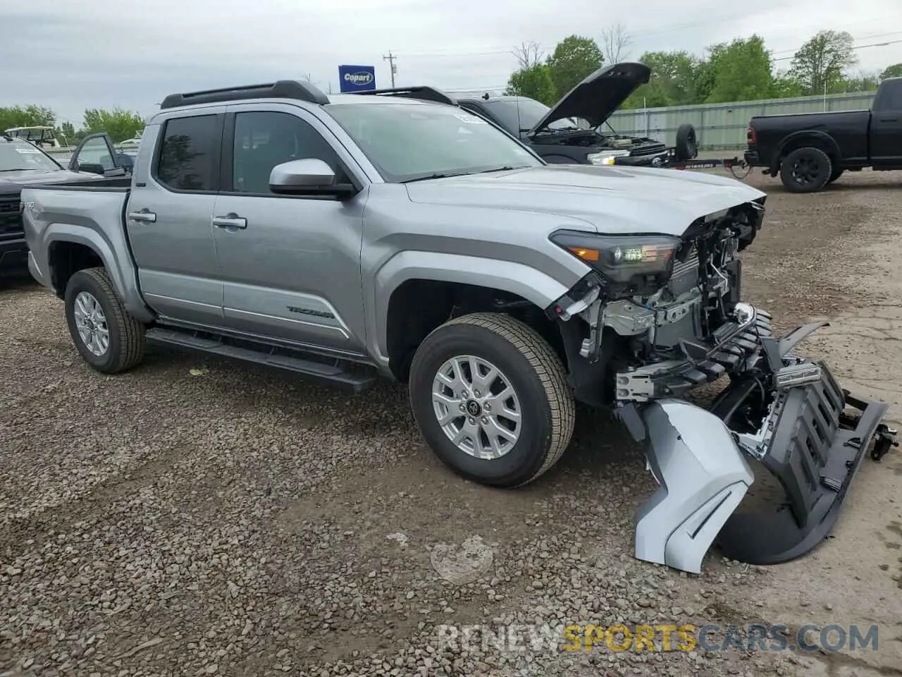 4 Photograph of a damaged car 3TMLB5JN7SM100983 TOYOTA TACOMA 2025