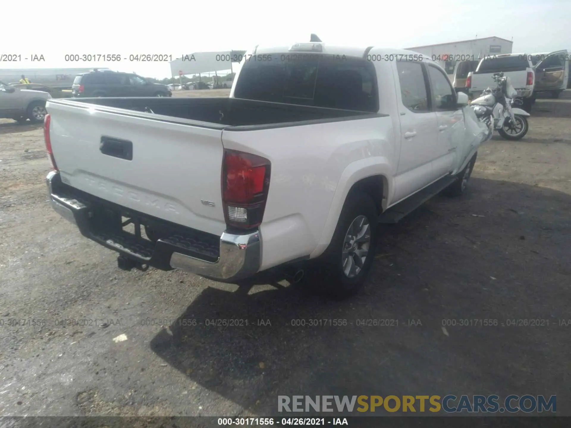 4 Photograph of a damaged car 3TMAZ5CN2KM097099 TOYOTA TACOMA 2WD 2019
