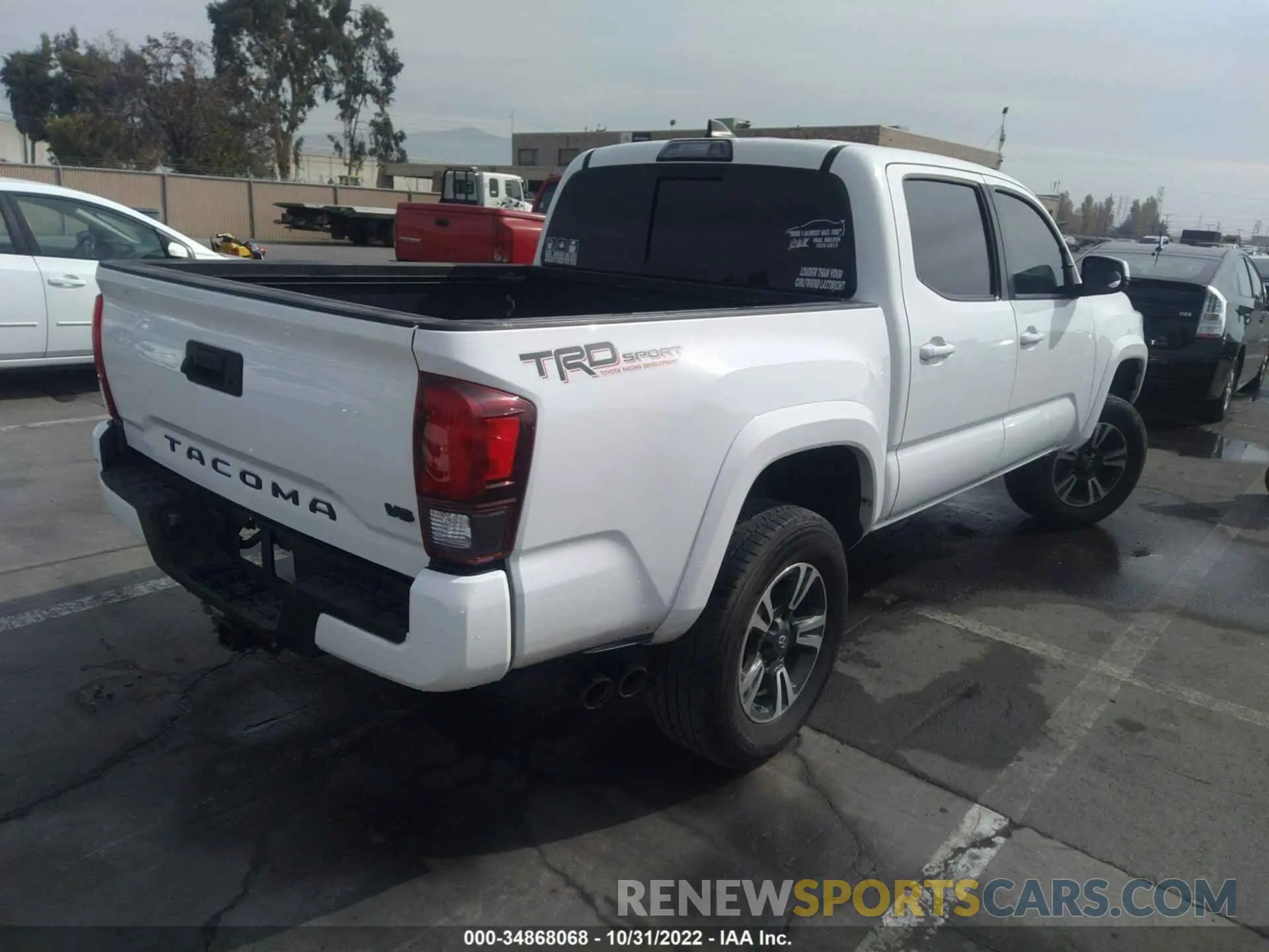 4 Photograph of a damaged car 3TMAZ5CN2KM098477 TOYOTA TACOMA 2WD 2019