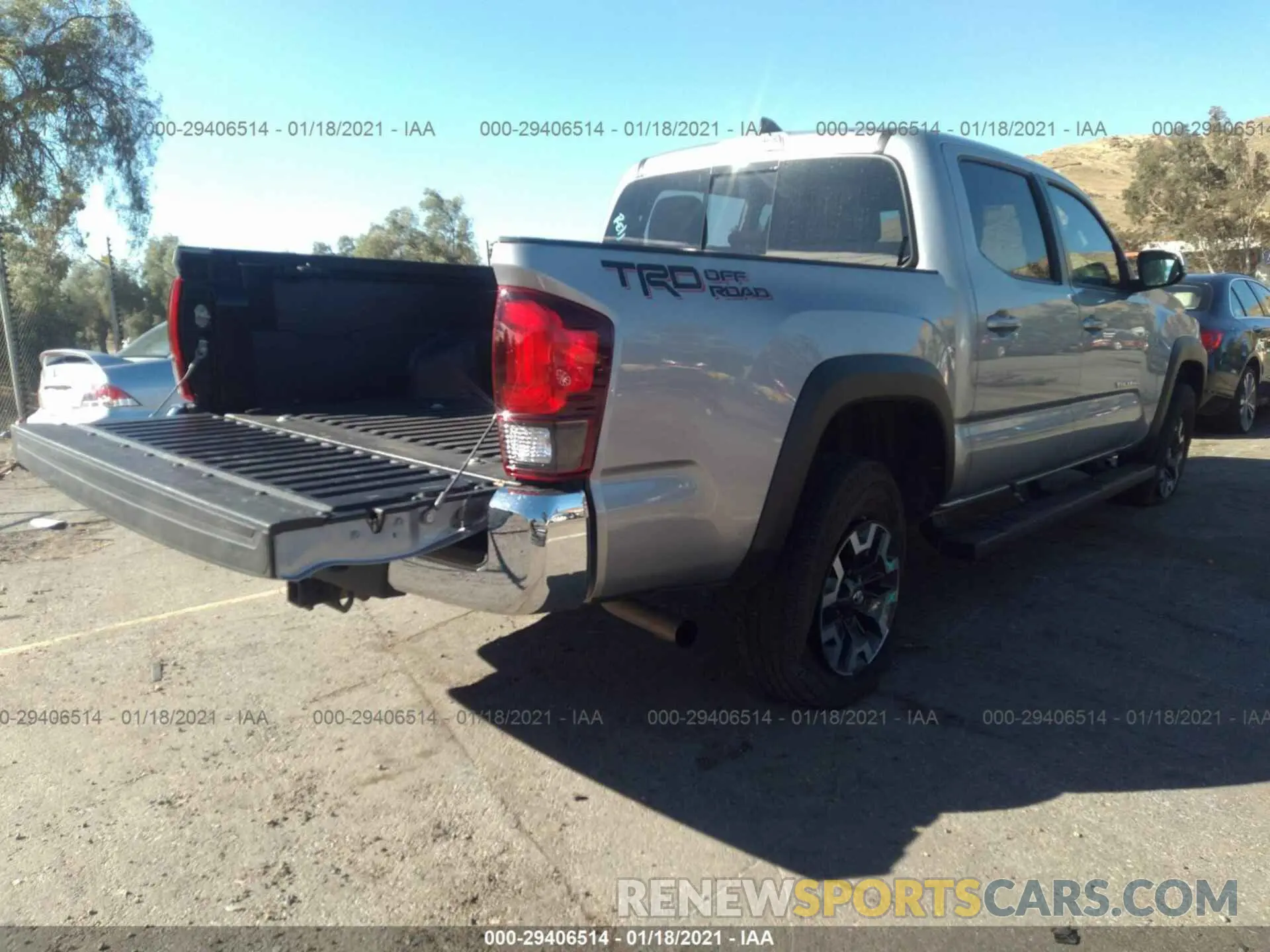 4 Photograph of a damaged car 3TMAZ5CN2KM099550 TOYOTA TACOMA 2WD 2019