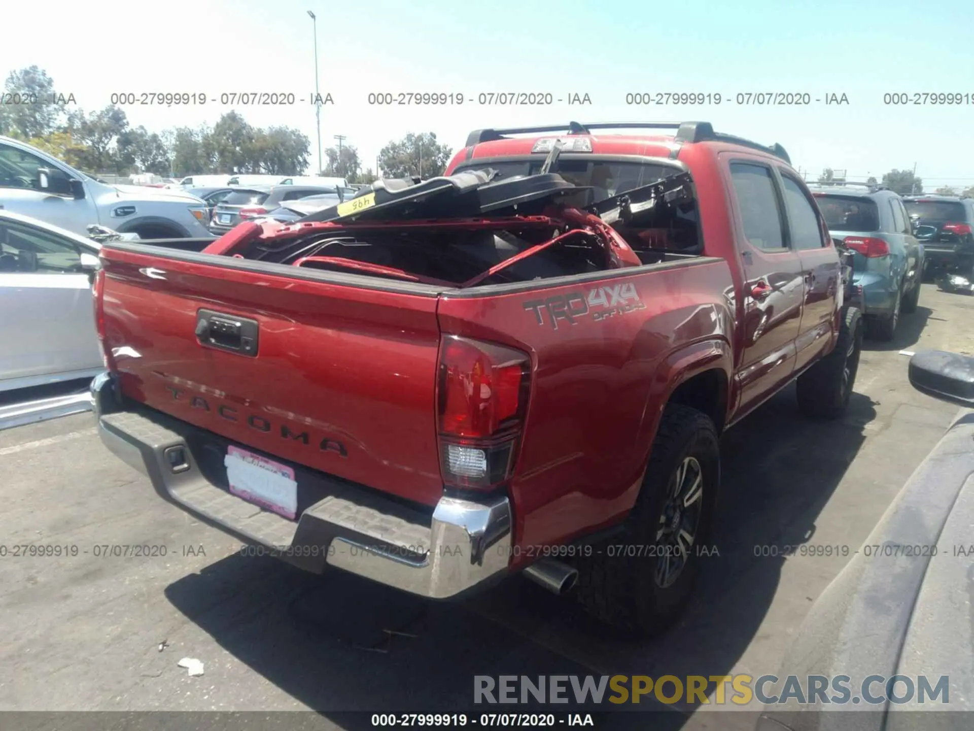 4 Photograph of a damaged car 5TFAX5GN3KX136809 TOYOTA TACOMA 2WD 2019