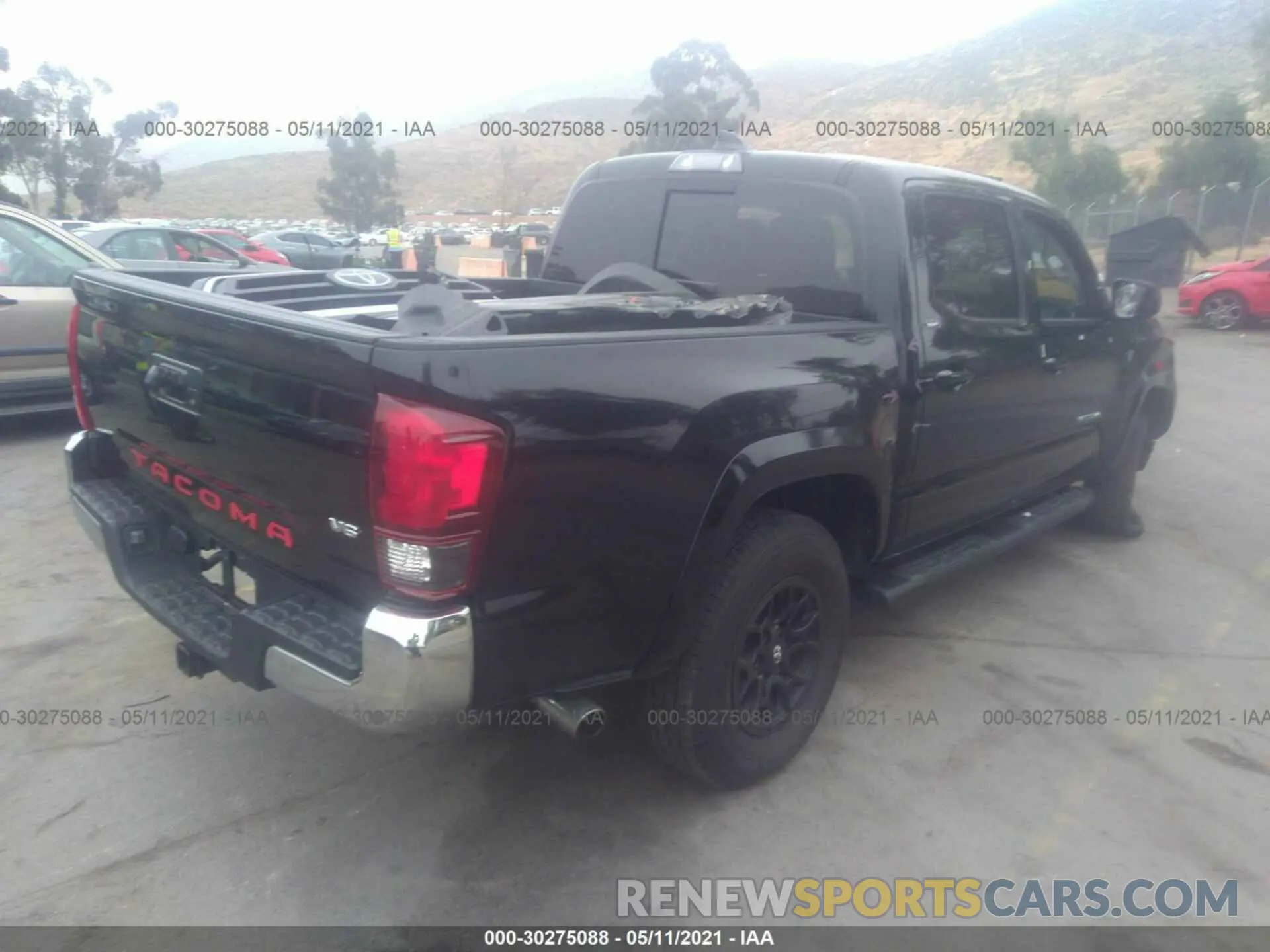 4 Photograph of a damaged car 3TMAZ5CN0MM145248 TOYOTA TACOMA 2WD 2021