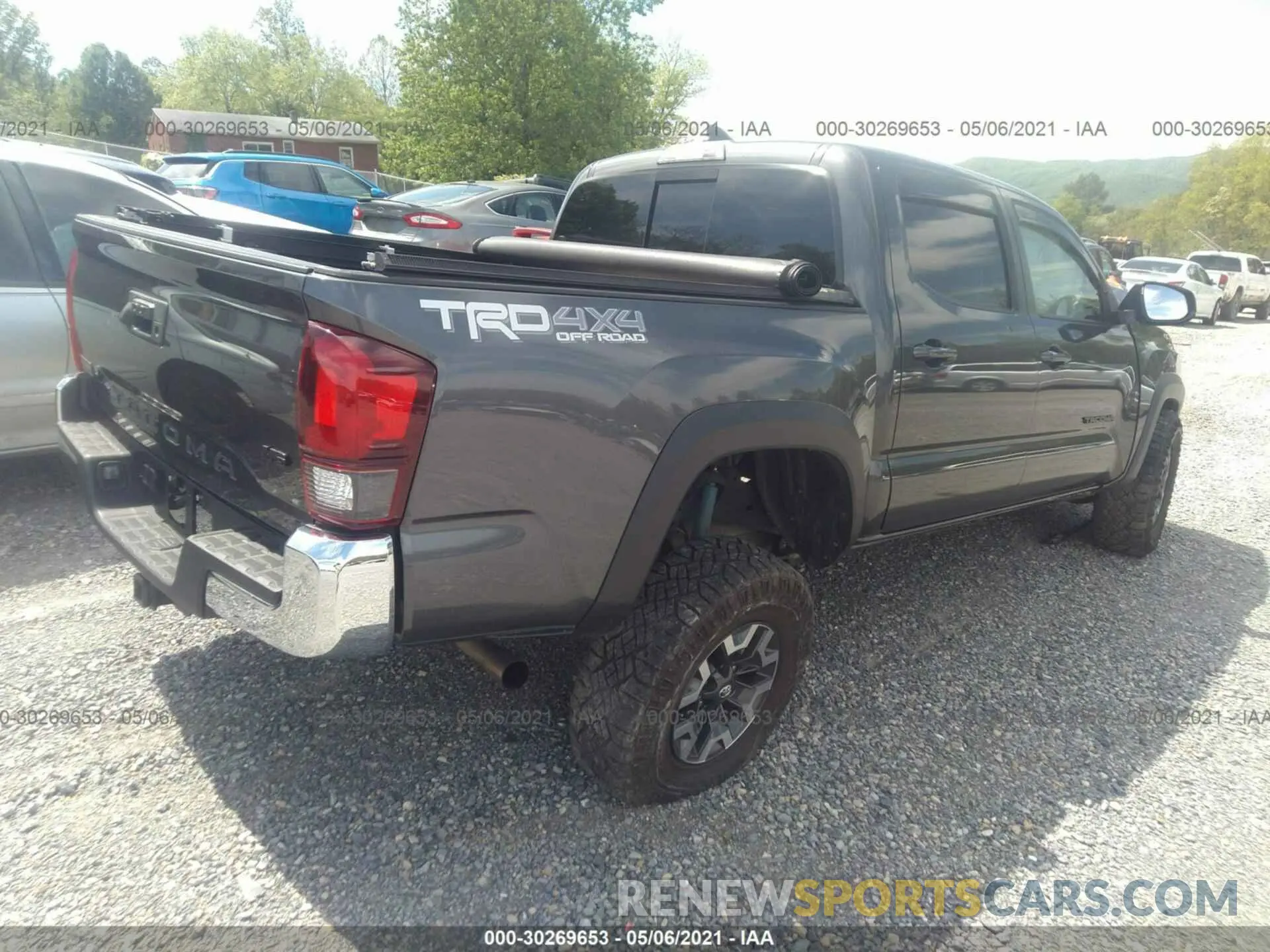 4 Photograph of a damaged car 3TMCZ5AN0KM192546 TOYOTA TACOMA 4WD 2019