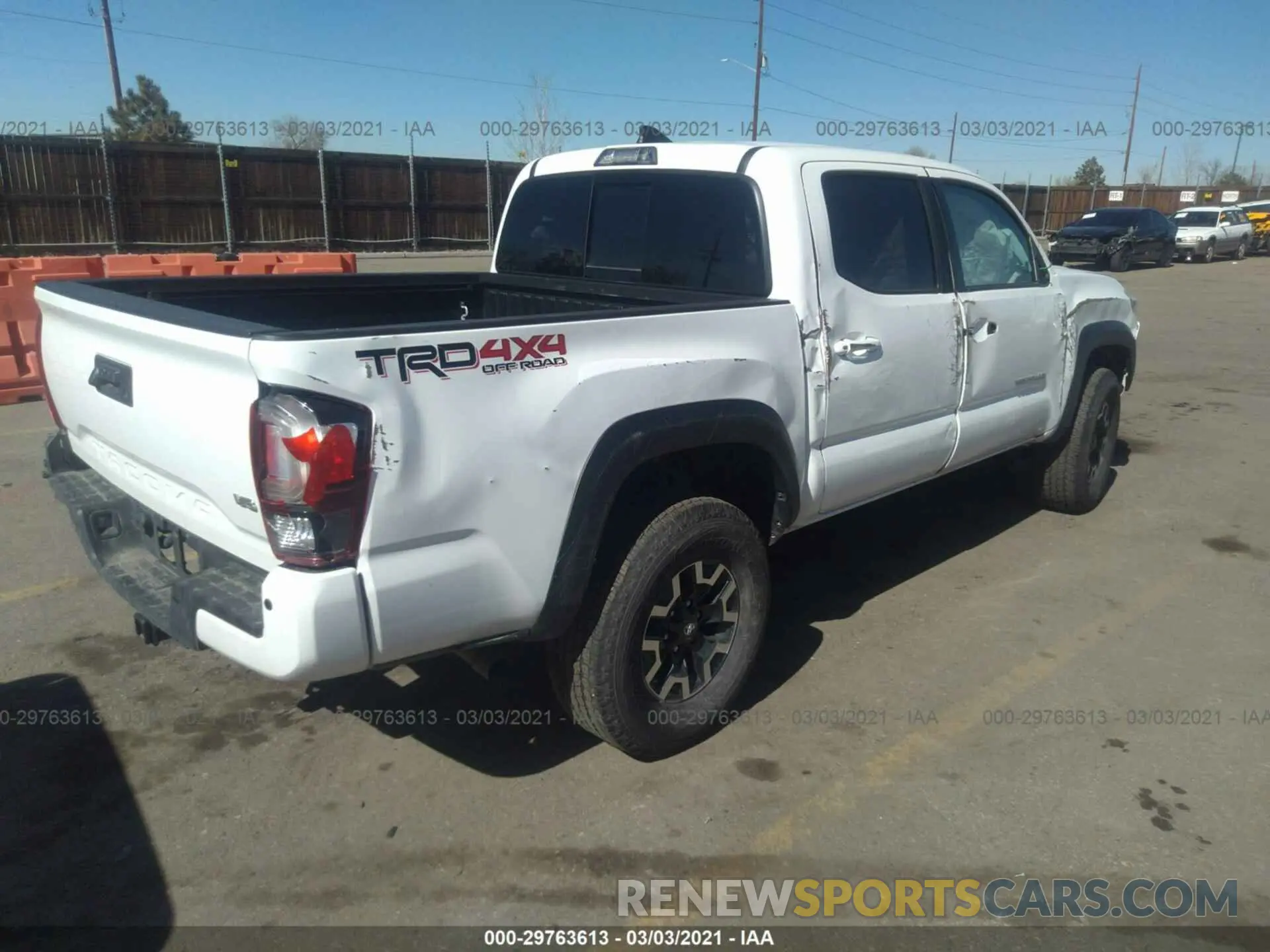 4 Photograph of a damaged car 3TMCZ5AN2KM230844 TOYOTA TACOMA 4WD 2019