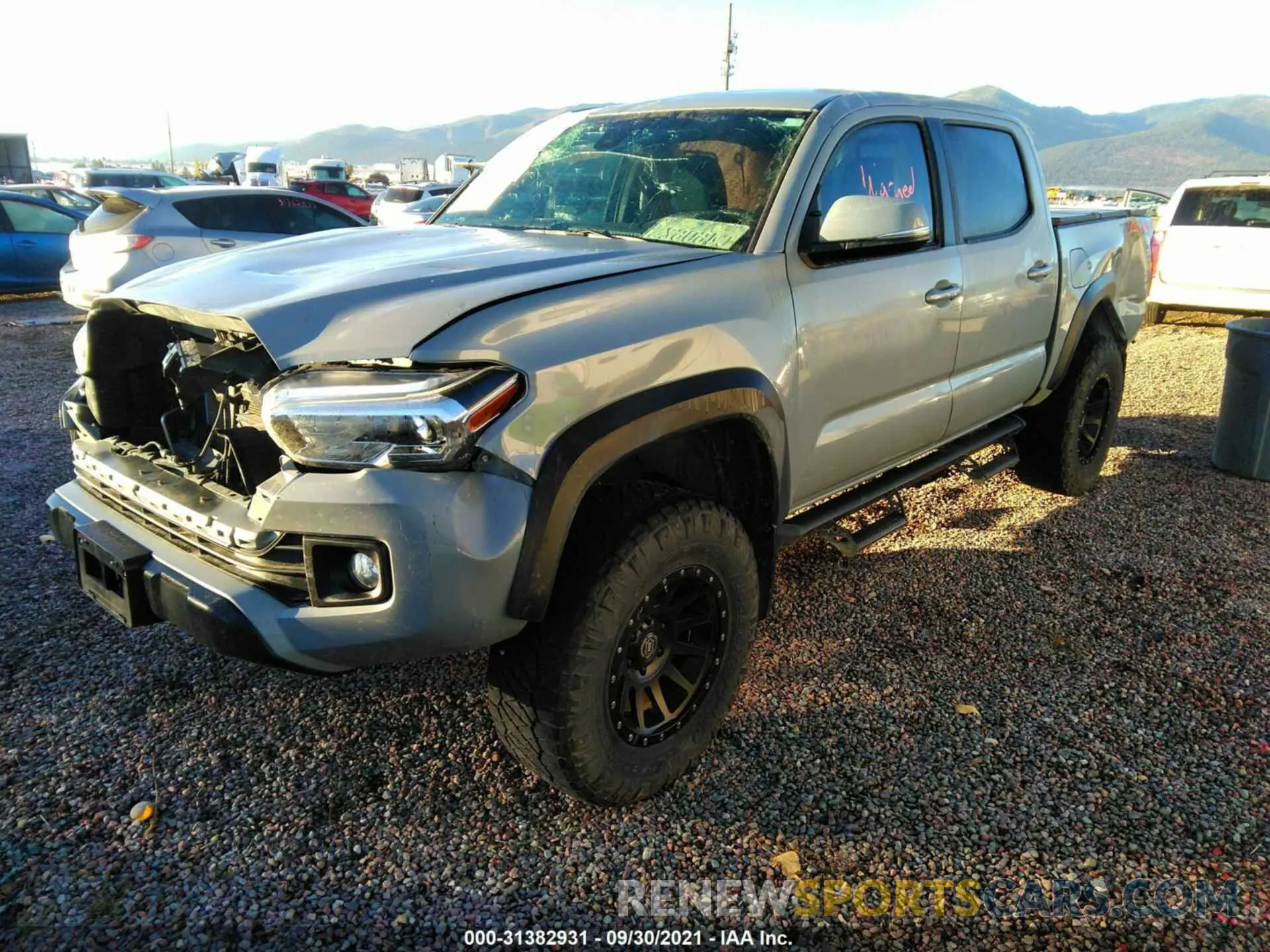 2 Photograph of a damaged car 3TMCZ5AN2KM275220 TOYOTA TACOMA 4WD 2019