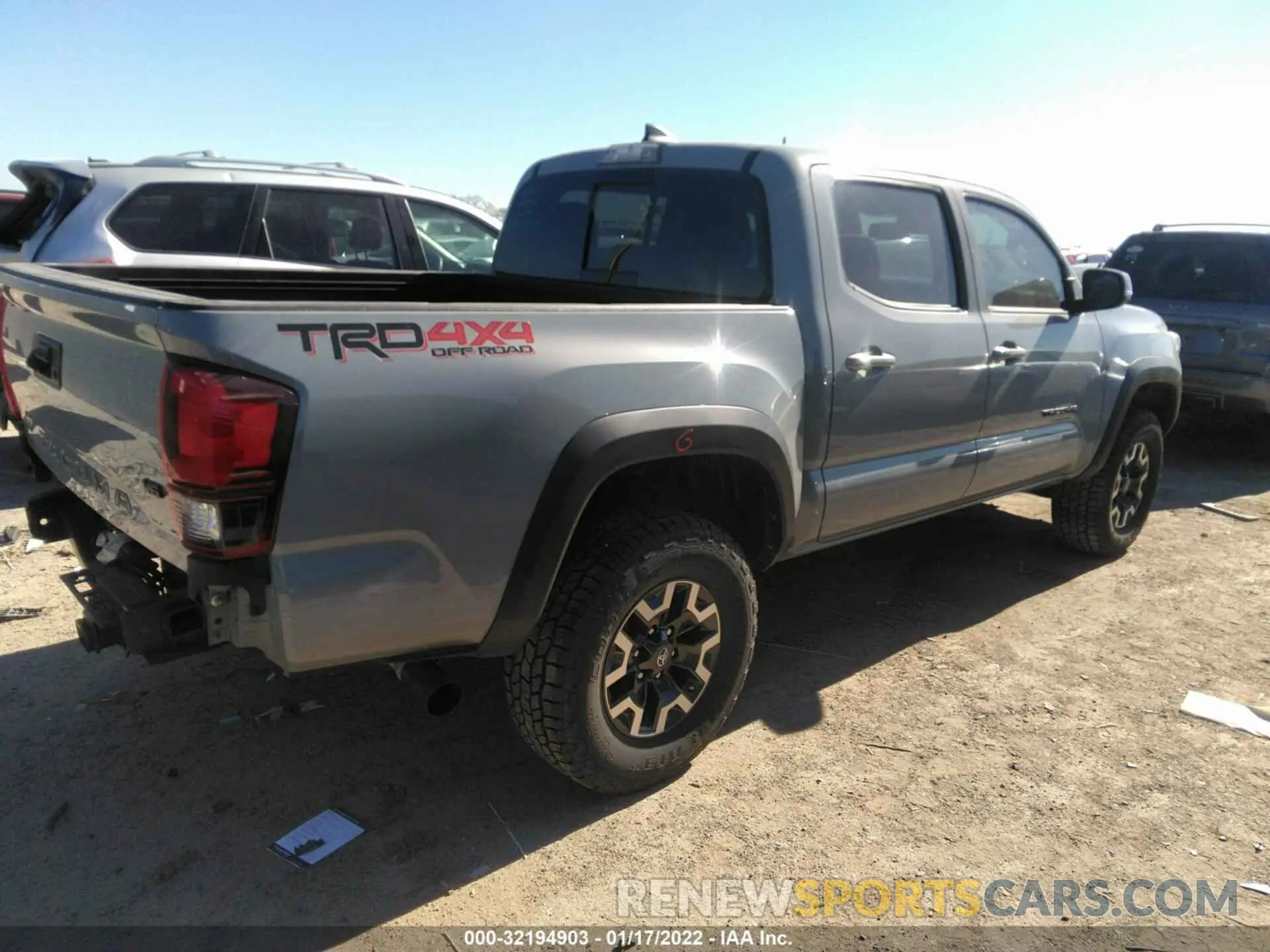4 Photograph of a damaged car 3TMCZ5AN5KM227811 TOYOTA TACOMA 4WD 2019