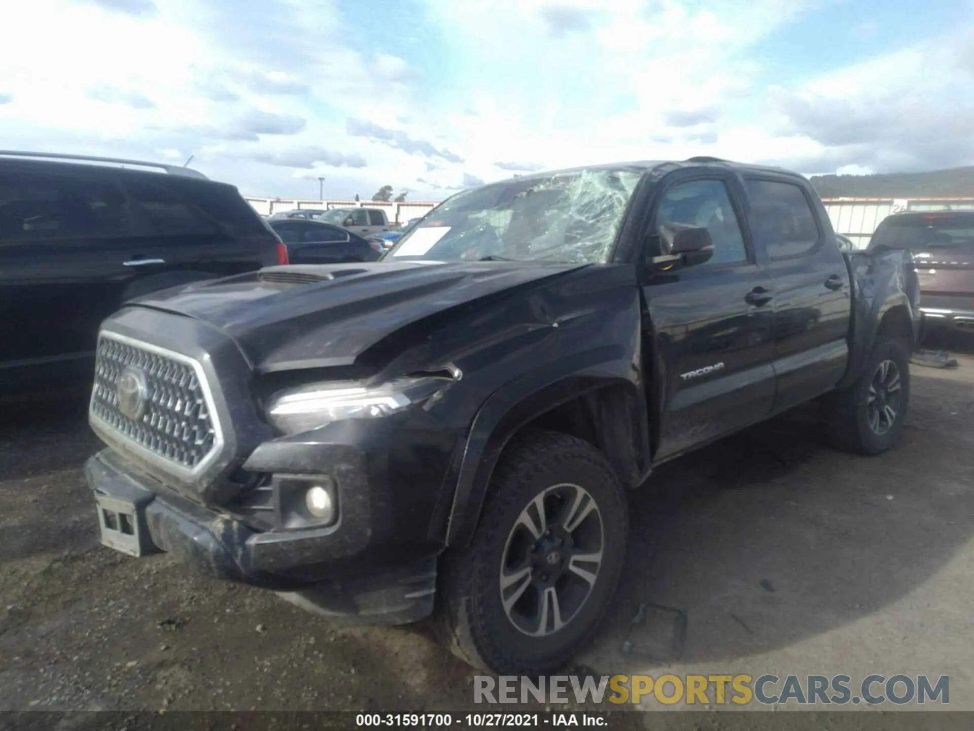2 Photograph of a damaged car 3TMCZ5ANXKM218554 TOYOTA TACOMA 4WD 2019