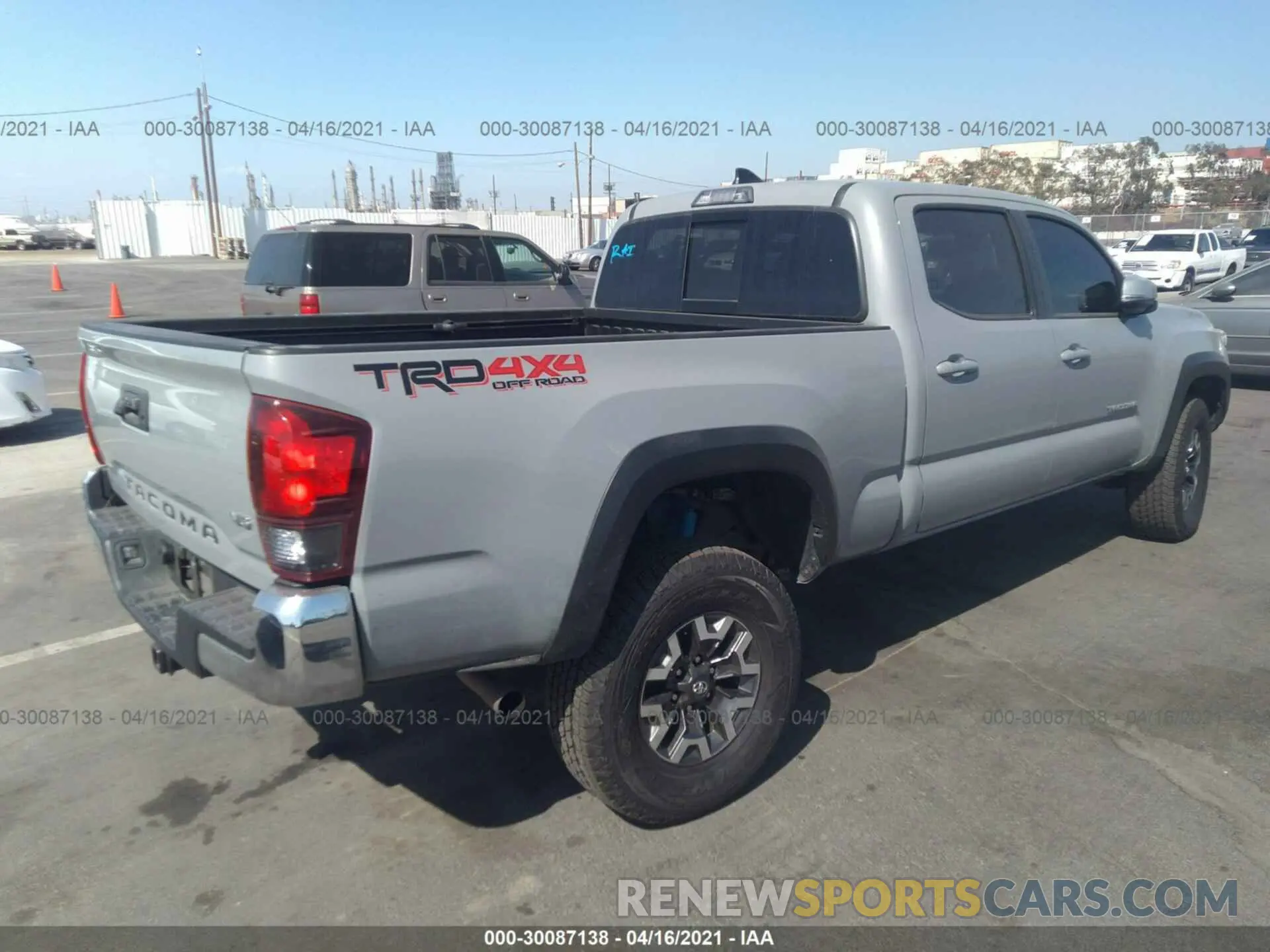 4 Photograph of a damaged car 3TMDZ5BN4KM073532 TOYOTA TACOMA 4WD 2019