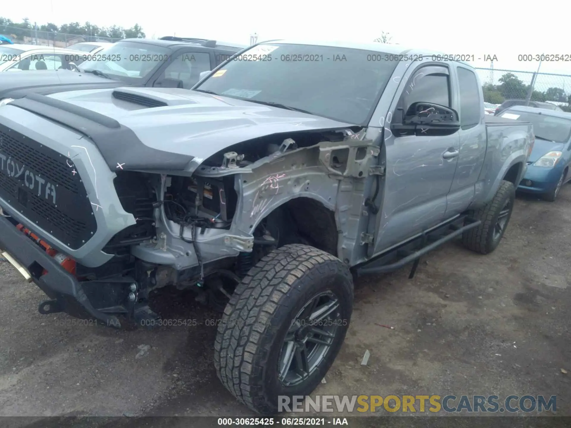 2 Photograph of a damaged car 5TFSZ5ANXKX174934 TOYOTA TACOMA 4WD 2019