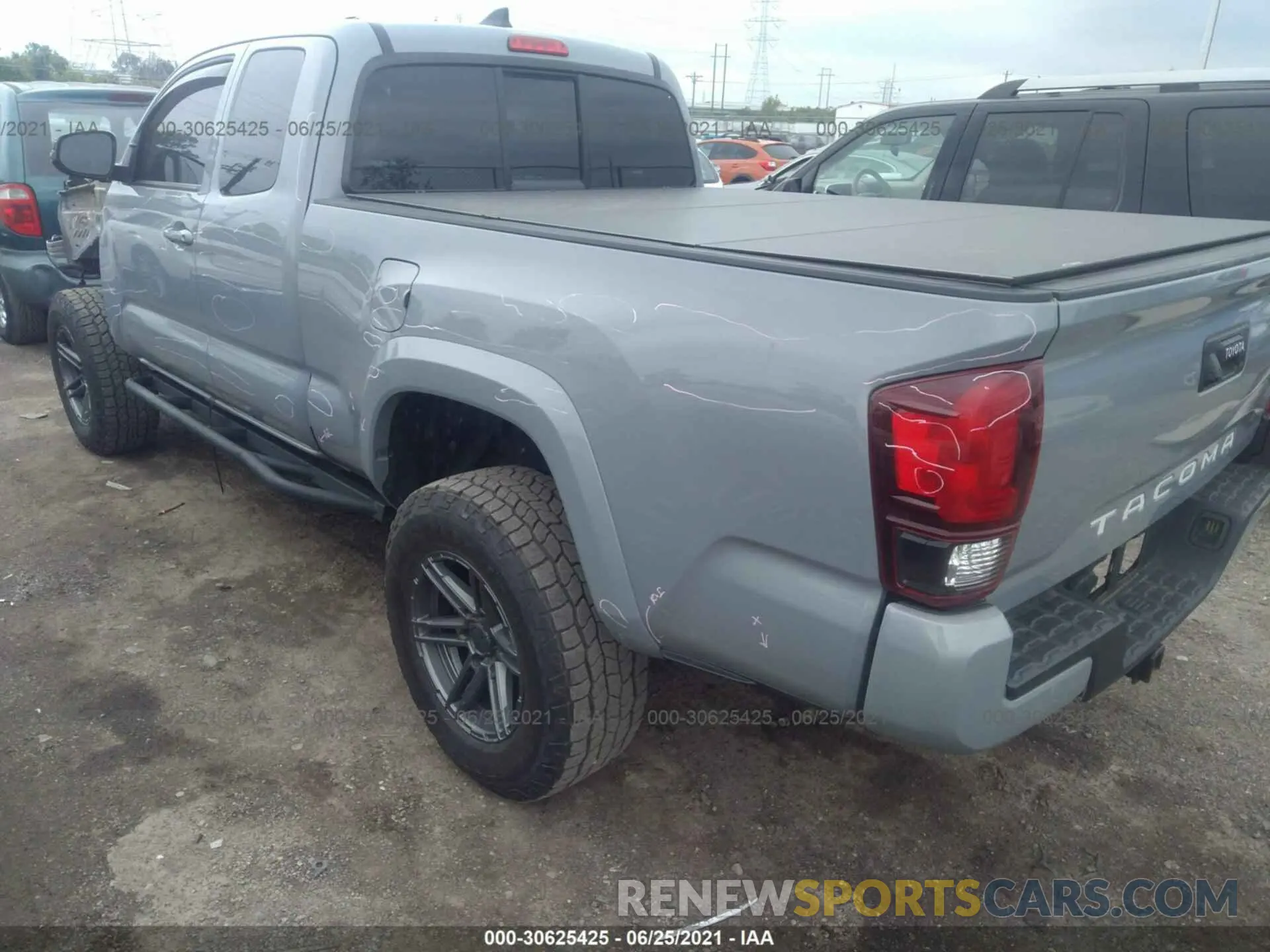 3 Photograph of a damaged car 5TFSZ5ANXKX174934 TOYOTA TACOMA 4WD 2019