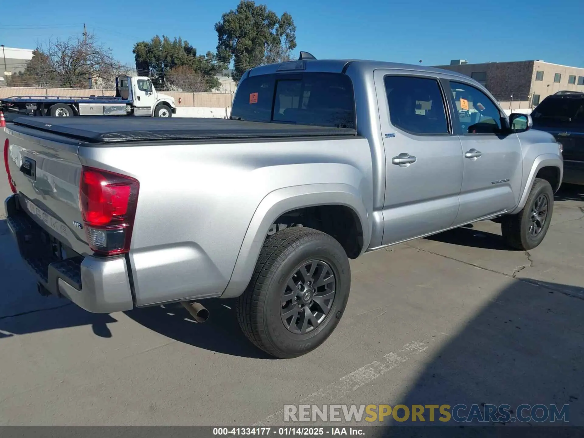 4 Photograph of a damaged car 3TMCZ5AN7LM329029 TOYOTA TACOMA 4WD 2020