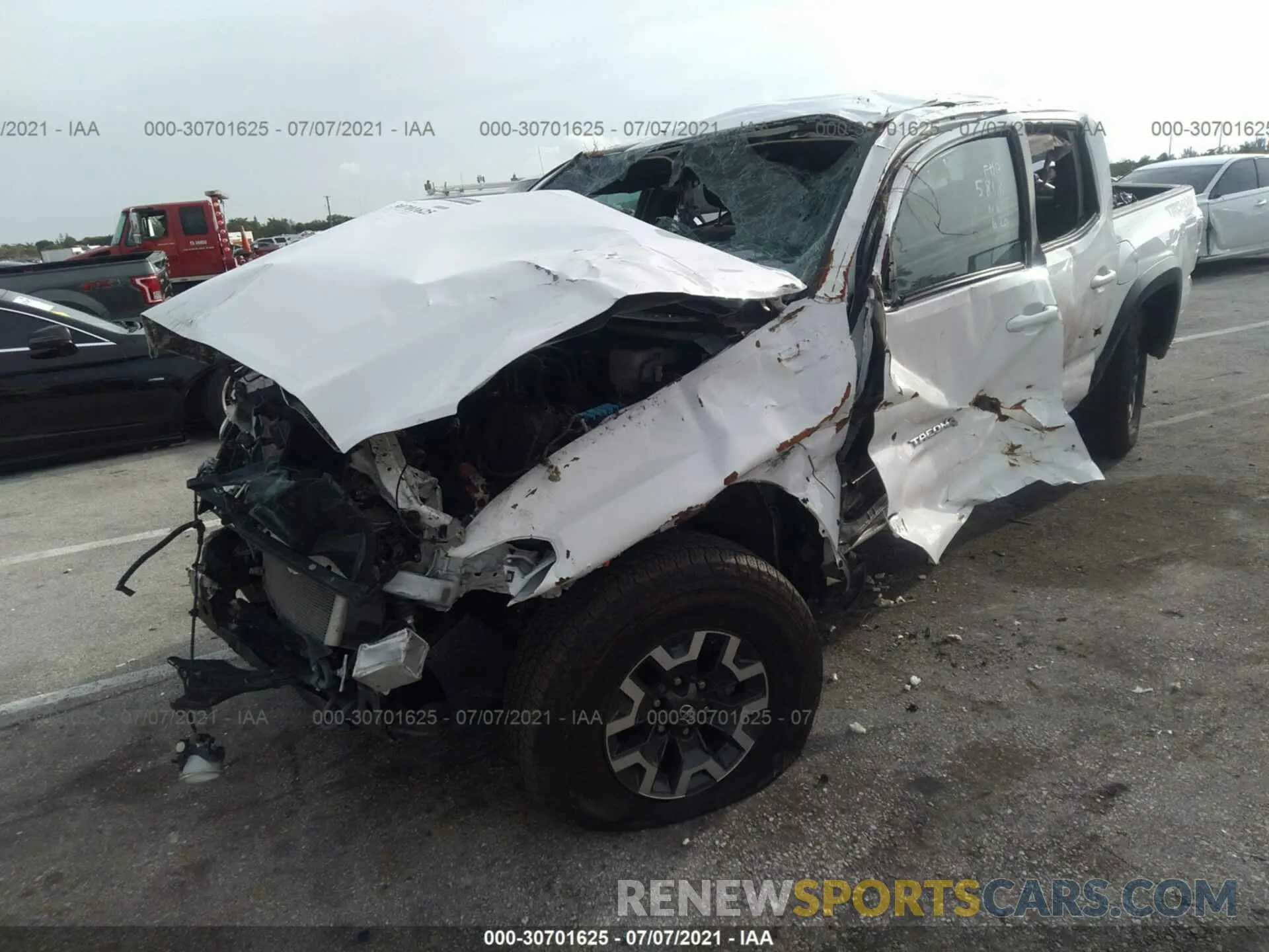2 Photograph of a damaged car 3TMCZ5AN9LM335818 TOYOTA TACOMA 4WD 2020