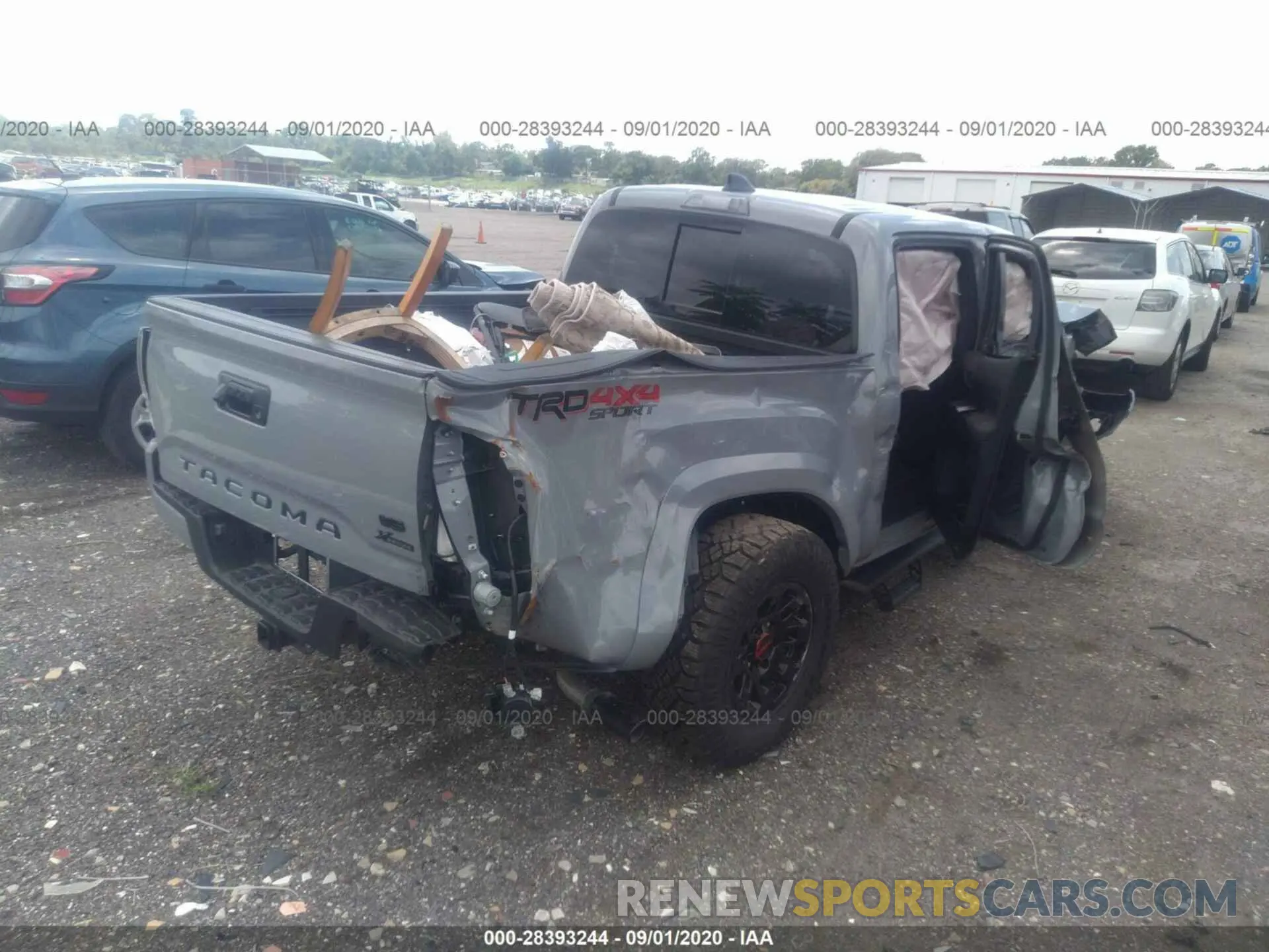 4 Photograph of a damaged car 3TMCZ5AN9LM342185 TOYOTA TACOMA 4WD 2020