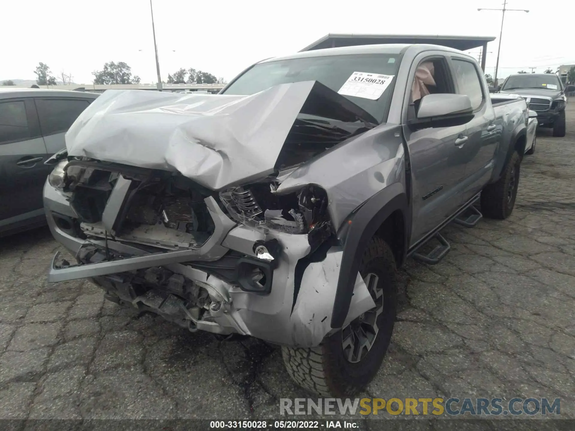 2 Photograph of a damaged car 3TMDZ5BN5LM095766 TOYOTA TACOMA 4WD 2020