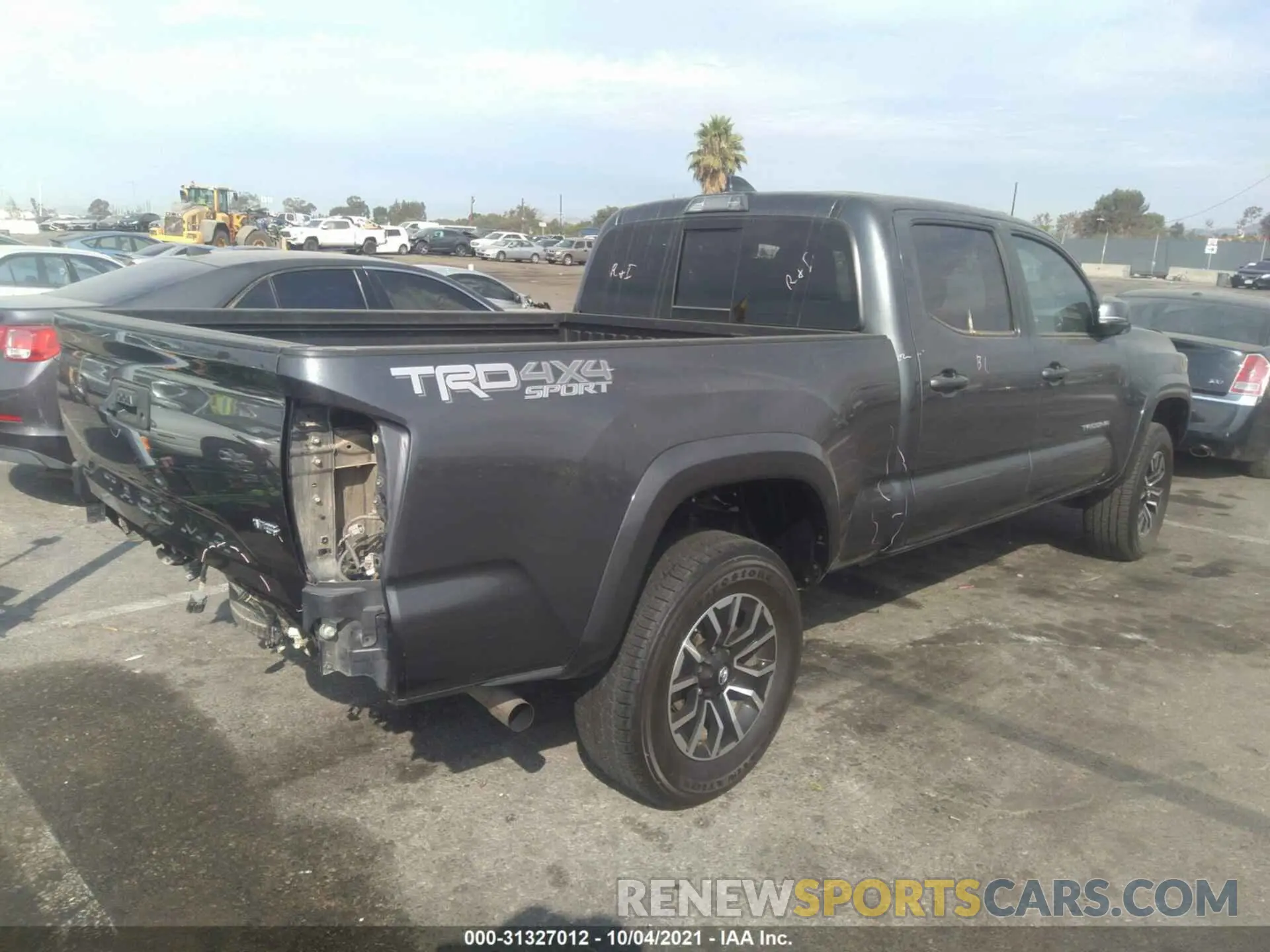 4 Photograph of a damaged car 3TMDZ5BN8LM096006 TOYOTA TACOMA 4WD 2020