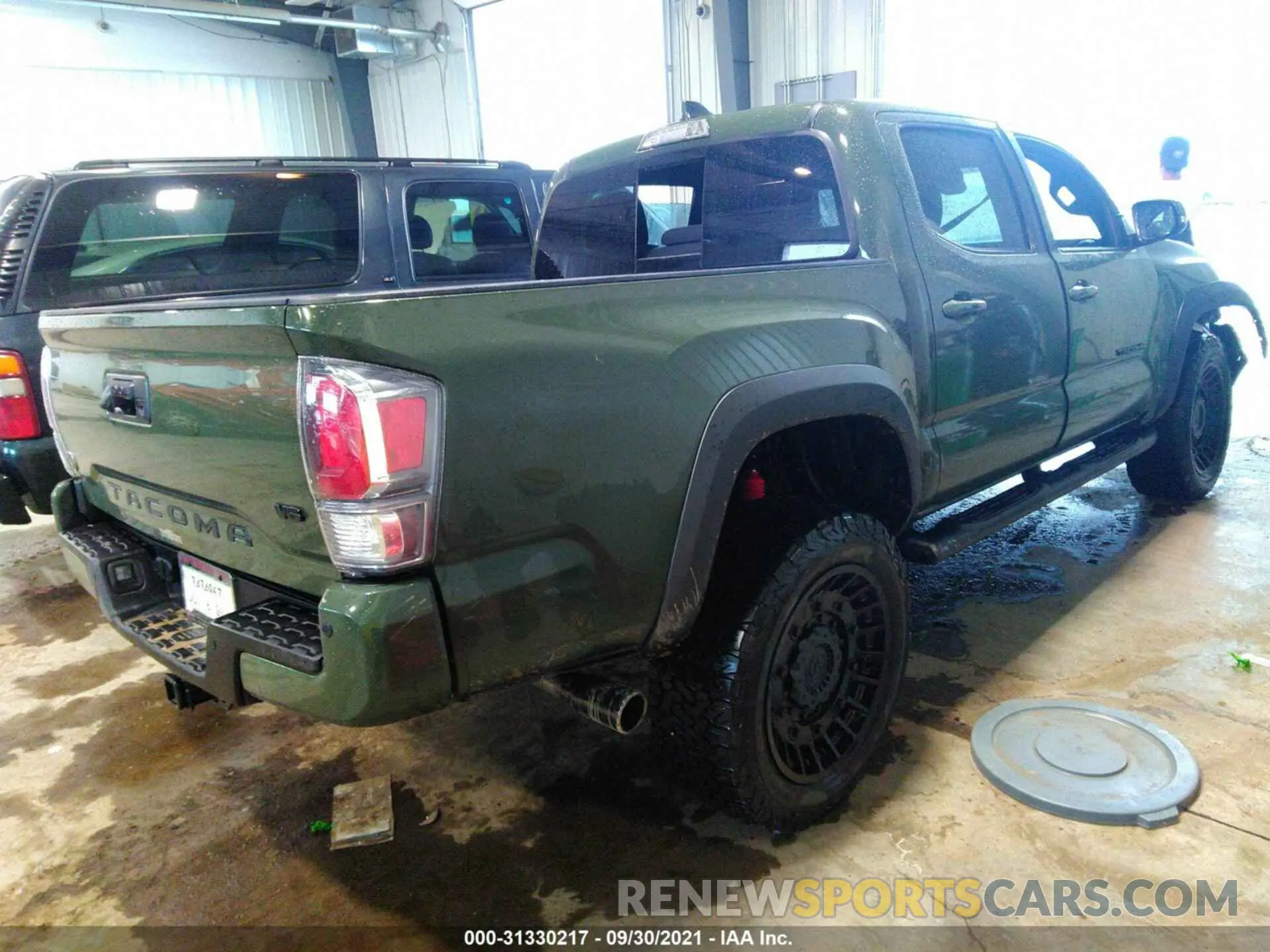 4 Photograph of a damaged car 3TMCZ5AN5MM432841 TOYOTA TACOMA 4WD 2021