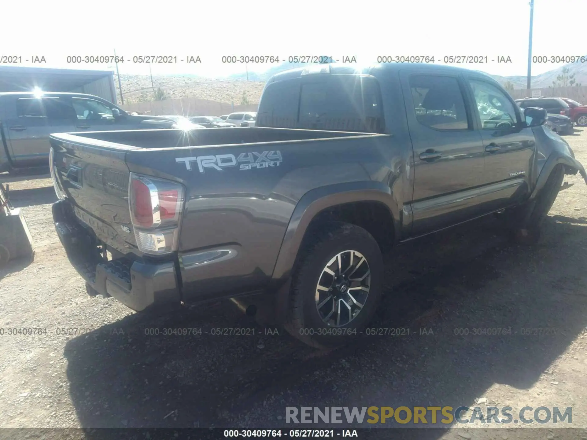 4 Photograph of a damaged car 3TMCZ5AN6MM399669 TOYOTA TACOMA 4WD 2021
