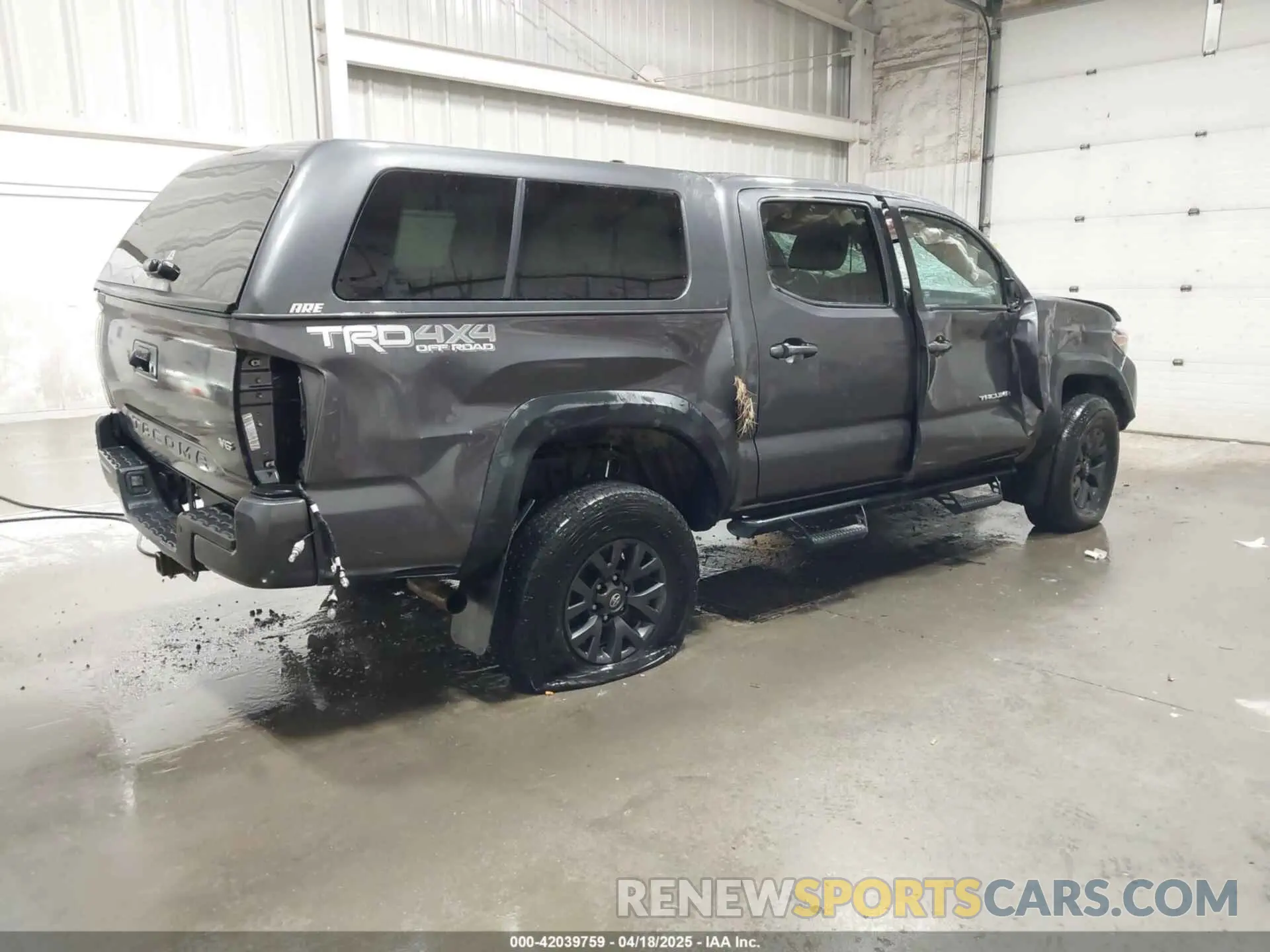 4 Photograph of a damaged car 5TFCZ5AN3MX257483 TOYOTA TACOMA 4WD 2021