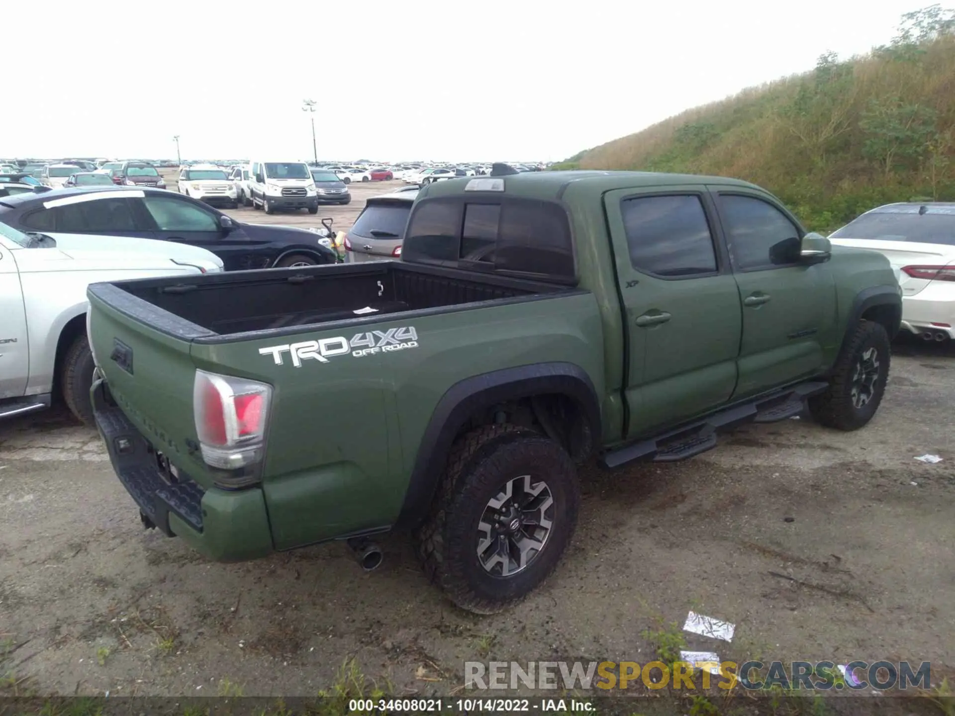 4 Photograph of a damaged car 5TFCZ5AN9MX245399 TOYOTA TACOMA 4WD 2021