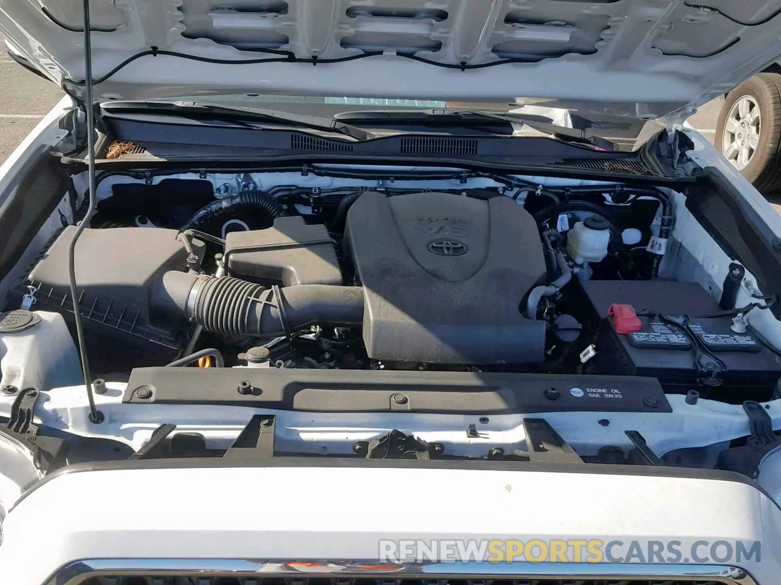 7 Photograph of a damaged car 3TMAZ5CN0KM086599 TOYOTA TACOMA DOU 2019