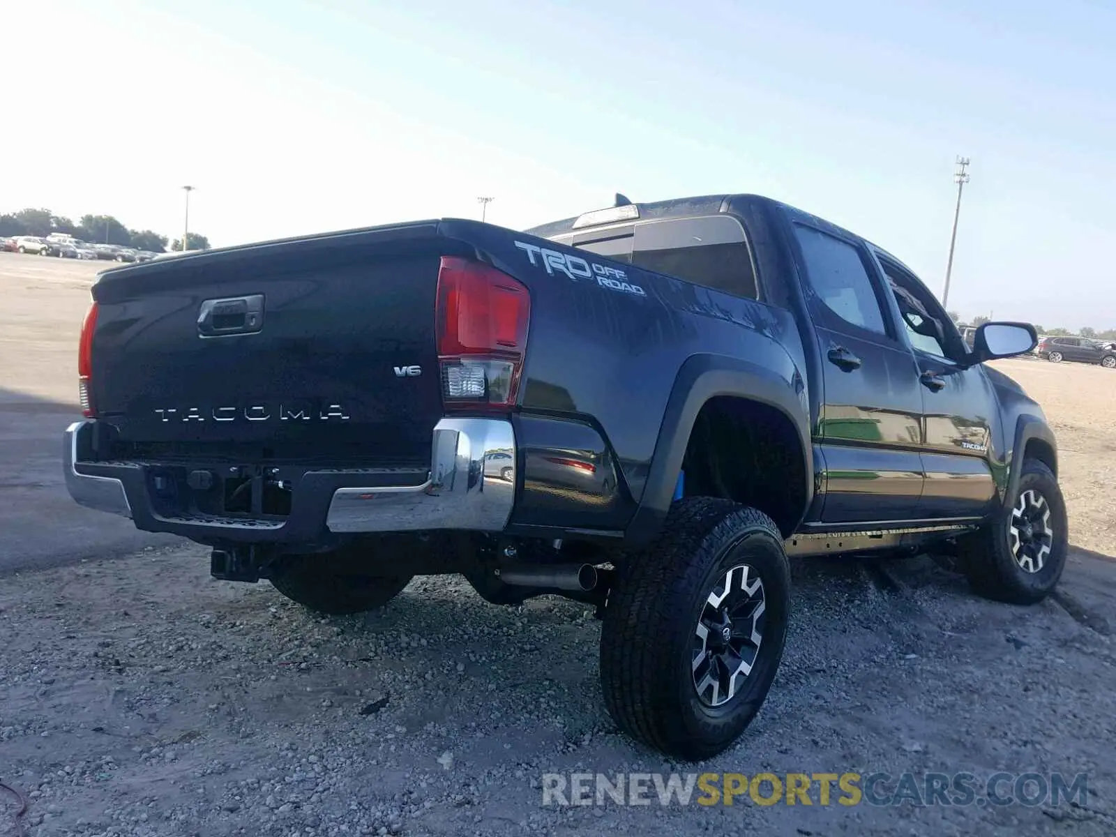 4 Photograph of a damaged car 3TMAZ5CN4KM086623 TOYOTA TACOMA DOU 2019